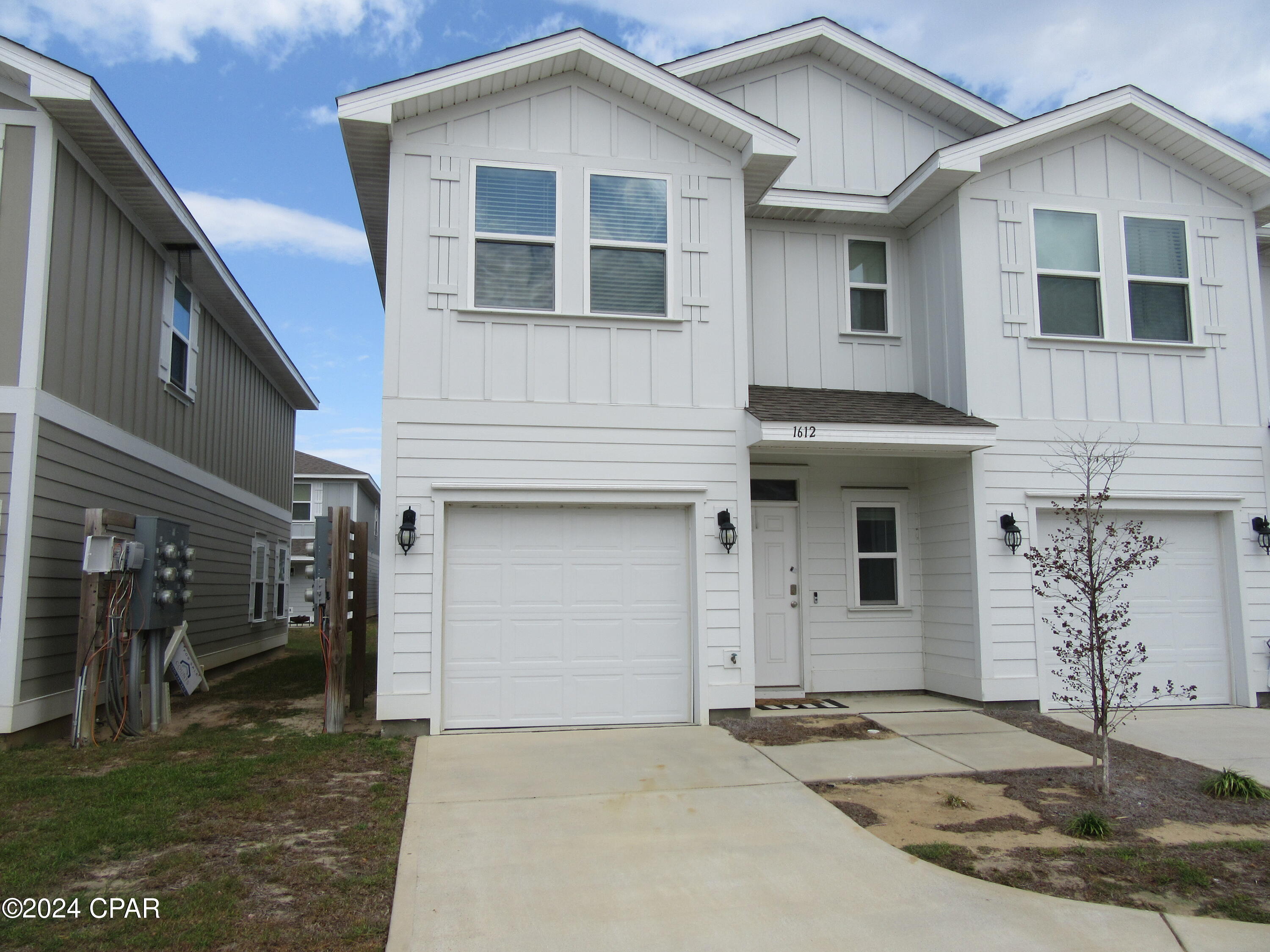 Beautiful like new 3 Bedroom 2.5 Bath Town House located at Landin's Landing in the much-desired Community of Lynn Haven with a 7-12-month lease option available. Close to shopping, dining and Tyndall Air Force Base and centrally located to the World's Most Beautiful Beaches, single car garage and driveway. This is an end unit with washer and dryer included. Tastefully decorated to include wood plank flooring, carpet throughout, granite countertops, custom cabinets and upgraded fixtures with stainless appliances. All property sizes and ages are approximate, please measure and/or verify if important. School assignments are subject to change, please check with Bay County for most accurate information. Deposit is the same as the rent. No pets allowed.