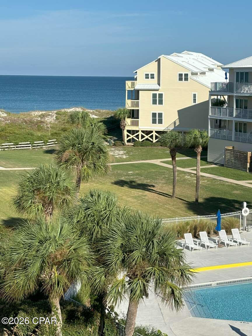 New Construction Townhome on wider lot than most in Seacliffs. Extra room to park - wider living spaces. Best place on Cape. High end construction. Largest elevator in seacliffs. Furnished and ready to rent - with 2027 rentals booked already or not if you dont want them! Stone countertops in kitchen and bathrooms, Impact windows and doors, spray foam insulation for low bills. 3 air conditioners for max comfort. Custom tile showers with glass doors. Vaulted living room ceilings. Covered porches on 3 levels with Polywood furniture. Decking is premium deck run side to side with no seams. Metal roofing. Pavers installed for low maintenance at courtyard. 2 separate washer and dryer hookups if you need to turn sheets quickly. Modern stairs without the Winder stairs often found in Seacliffs. Thoughtful space under the stairs. Extra storage on ground level plus a second refrigerator on the ground floor. Large TV on swing arm in Living room with great wrap around sofa. The stairs have motion lights. 2 bedrooms with king beds have balconies. 1 queen bedroom and 1 bunk room with 4 XL twin size beds have bay windows. Double vanities with stone tops and custom tile showers in King and Queen bathrooms. Kitchen is magnificent and open with a long bar top with seating and pendant lights, soaring vaulted ceiling. Walk in Pantry and a separate owners closet also in the kitchen. Floors are high-quality LVP for lasting beauty and low maintenance.