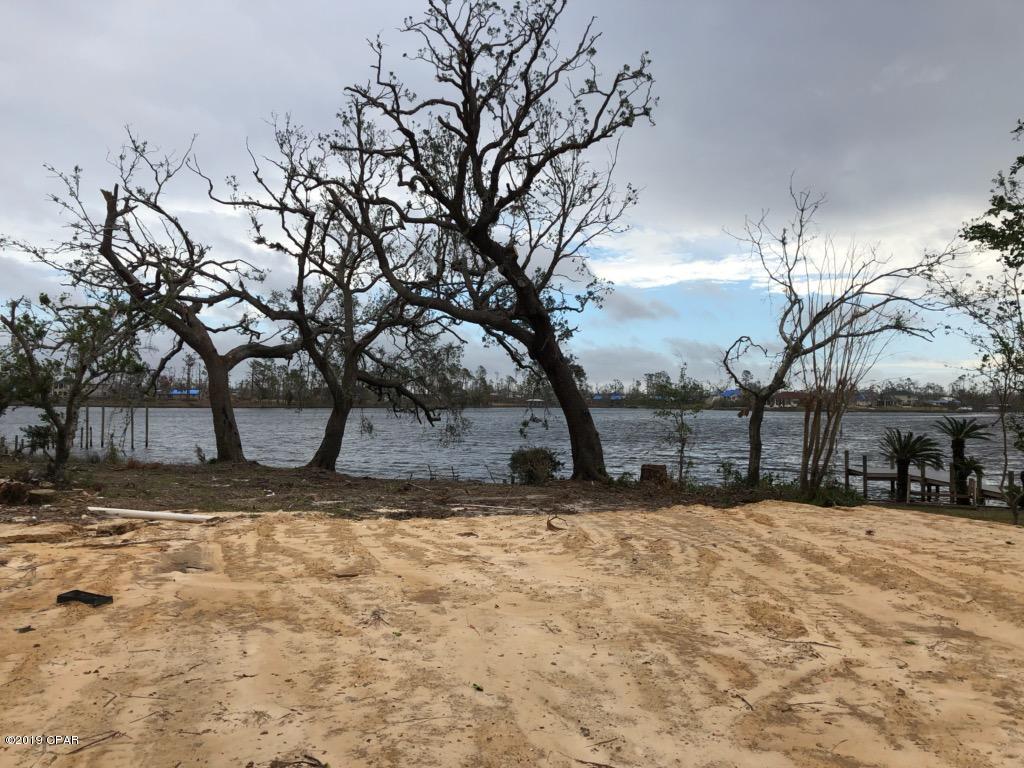 This is a beautiful waterfront homesite, cleared and ready for you to build your dream home on!  The home was damaged beyond repair during Hurricane Michael , and the owners intended to rebuild, but have found another suitable residence since then, so are willing to sell this beautiful property!