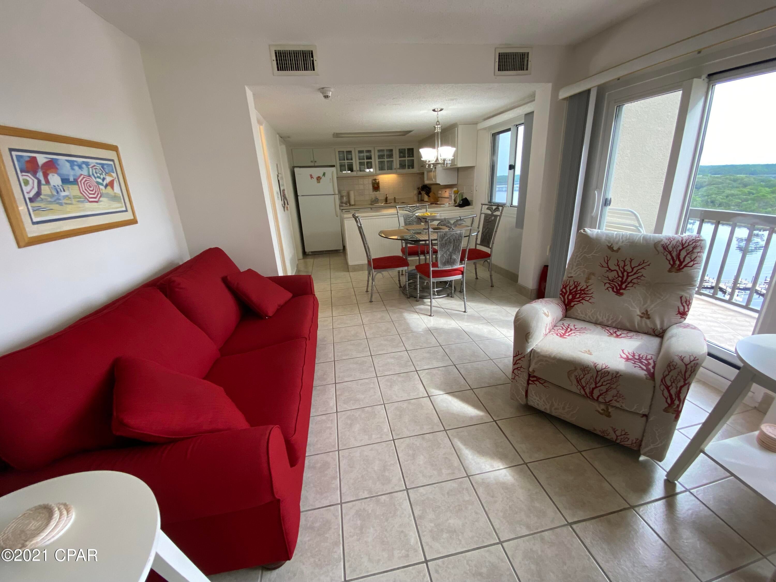 UNDER CONTRACT.  SELLER IS TAKING BACKUP OFFERS.  Beautiful Gulf views from this 2 bedroom, 2.5 bath unit that also overlooks Lake Powell.  The unit is on the 9th floor of Pinnacle Port's Tower building and comes fully furnished.   The owners have used this condo for their friends and family and have taken excellent care of the unit.   Pinnacle Port Resort is situated on a 25+ acre site within a beautiful gated community having a large beach frontage!  The complex has lots of amenities including two swimming pools, tennis courts sauna/steam room, fitness room, its own private freshwater dock with boat slips boat launch and wi-fi.   Please note that the Association fees include electricity for heating, cooling and hot water. The owner pays a small electricity bill for lighting and appliances only