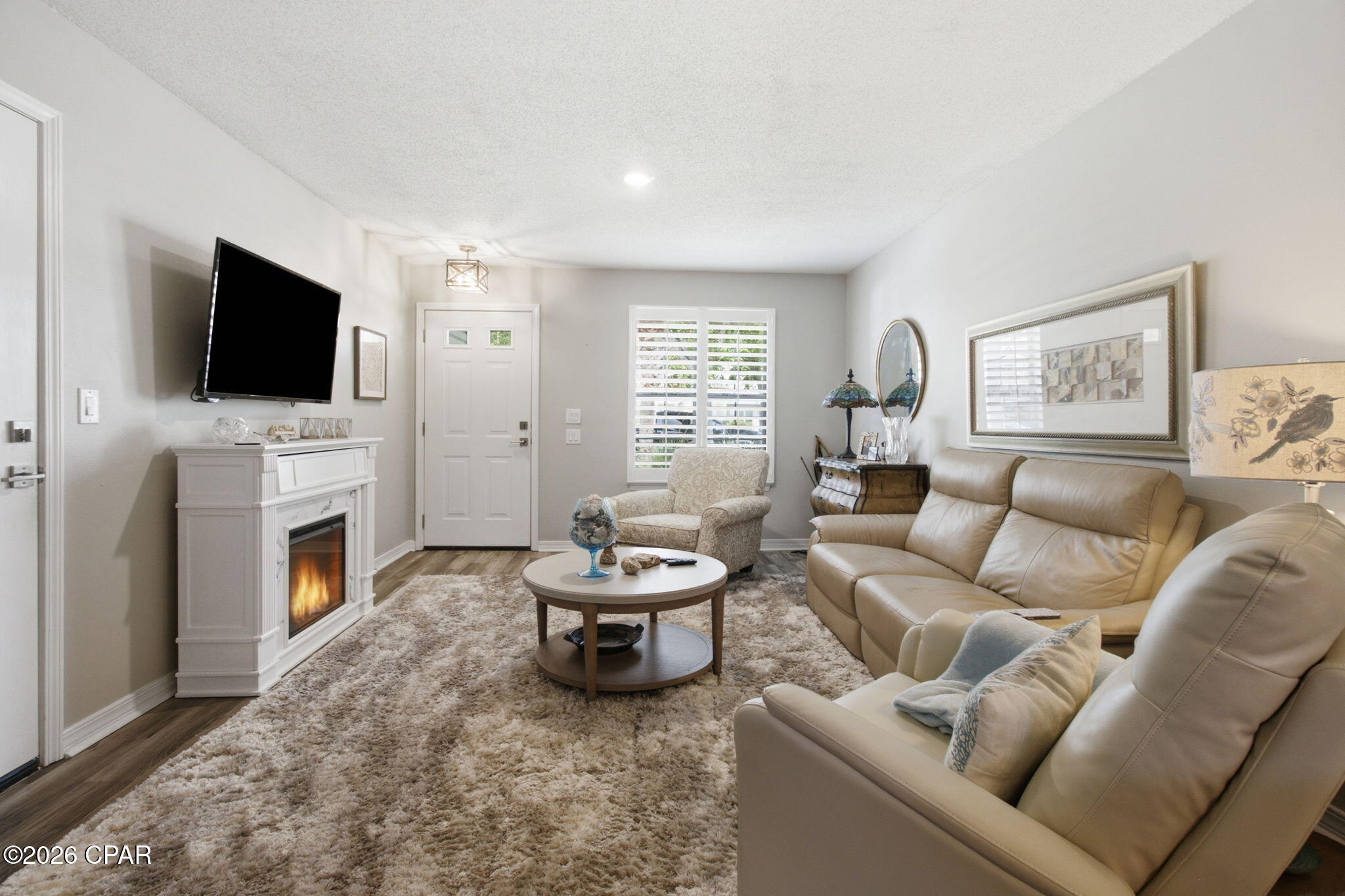 Excellent investment opportunity in the highly desirable Palmetto Trace community! This well-maintained 2-bedroom, 2-bath end-unit townhome is already tenant occupied, with a renter who would love to stay, offering immediate income potential from day one.

The seller has completed numerous updates, including a **new roof in 2024**, new luxury vinyl plank flooring, fresh interior paint, updated light fixtures, new appliances, granite kitchen countertops, and quartz vanity tops in both bathrooms with new sinks and faucets, making this a truly turnkey investment. Also comes with metal hurricane shutters. 

Overlooking a peaceful pond, the home enjoys added privacy and relaxing water views from the back patio. Inside, you'll find a bright, open floor plan with spacious living areas, abundant natural light, and low-maintenance living.

Residents of Palmetto Trace enjoy two community pools, sidewalks, beautifully landscaped green spaces, and a welcoming neighborhood atmosphere. Ideally located just minutes from Pier Park, Frank Brown Park, shopping, dining, and the sugar-white beaches of the Gulf, this home offers the perfect combination of convenience, comfort, and investment potential.

Whether you're looking to expand your rental portfolio or secure a low-maintenance beach property, this is an opportunity you won't want to miss.