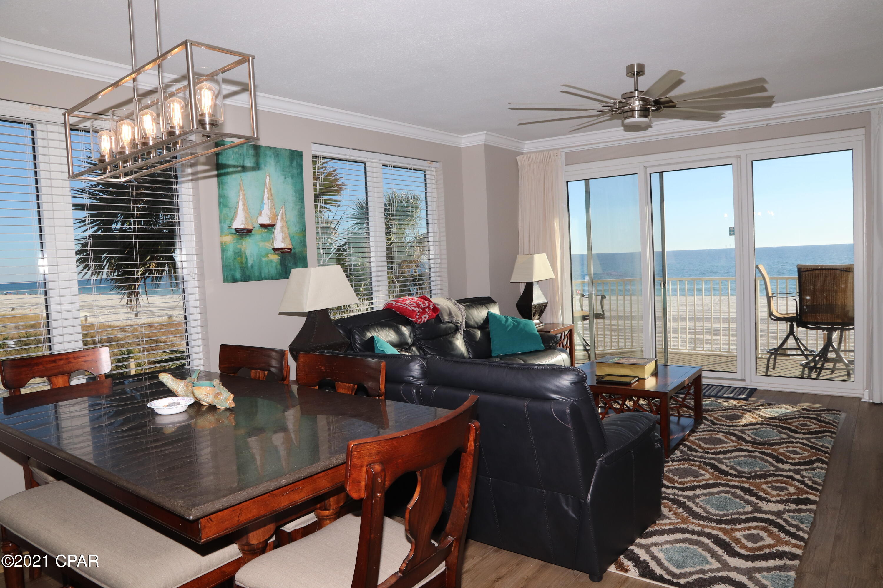 CURRENTLY UNDER CONTRACT, SELLER ACCEPTING BACKUP OFFERS.......  1st floor, corner unit with TONS OF NATURAL LIGHT.   This 3bd/3bth has OVER 1,900 SQFT.   COMPLETELY UPDATED AND UPGRADED.  Large wood look plank flooring throughout.  All light fixtures and fans changed out.  Painted.  Seller lived in the condo personally and it is in absolutely pristine condition.   GULF FRONT MASTER BEDROOM.  Tempurpedic mattresses in Master and other King bedroom.  Separated tub and shower in master.  Stainless Steel appliances.   Deeded parking space, walk right up 1 flight of stairs to your condo.