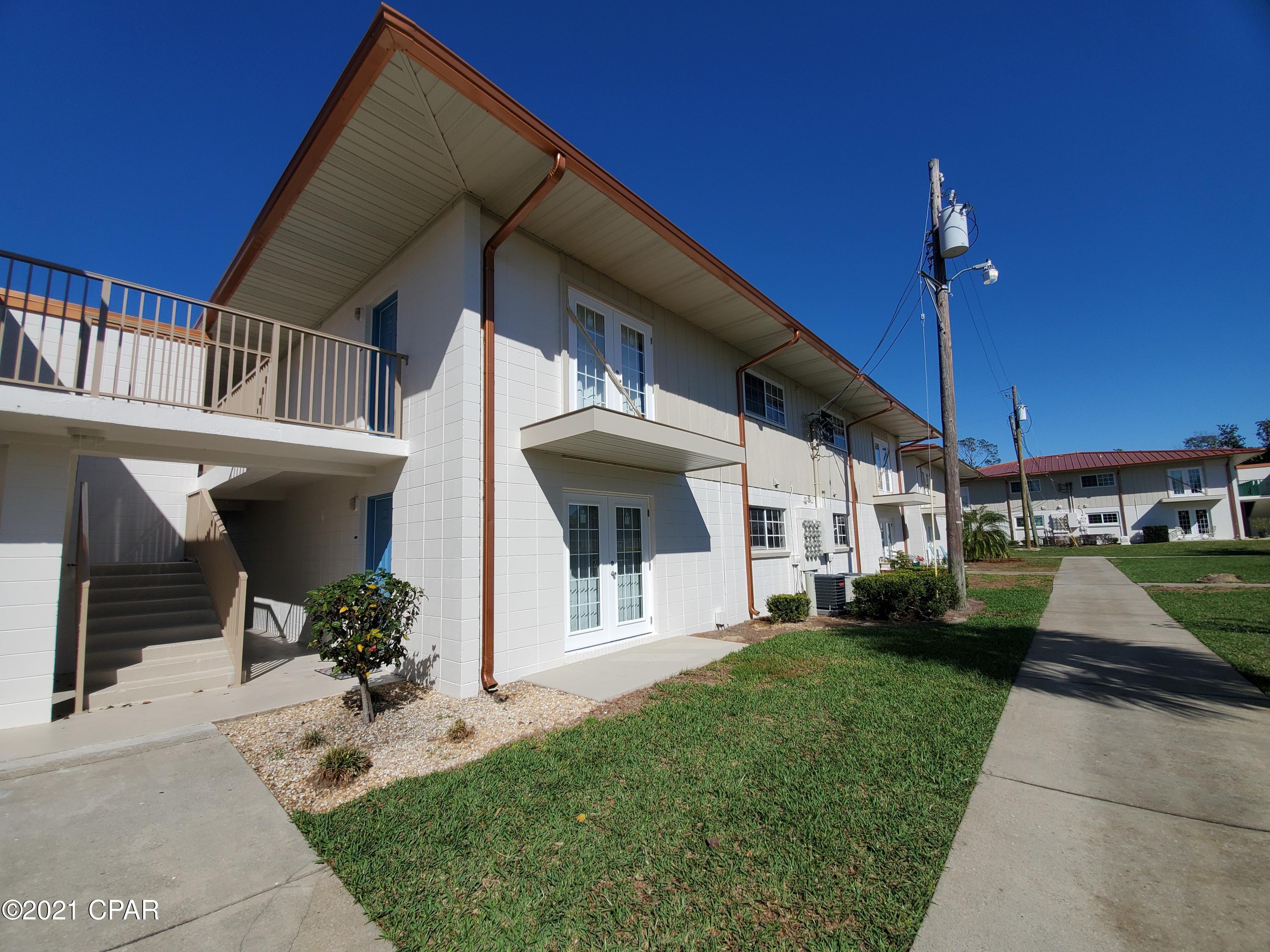 For rent. This first floor unit has ceramic tile floors throughout and painted with calming neutral colors. The condo is located on the North side of Landmark with a view of the pool and lush landscaping from the patio. Landmark Condominium is within easy walking distance to local favorite restaurants. Come see this neat complex that sits alongside St. Andrews Bay and features 2 pools, a private beach, and 7 beautifully landscaped acres. Whether it is July or December, this complex is quiet and offers the best of Bay living with easy access to the Gulf of Mexico. Rent includes Cable TV, water, sewer, and garbage. *Pets up to 24 pournds negotiable upon approval with $250 non-refundable pet fee.