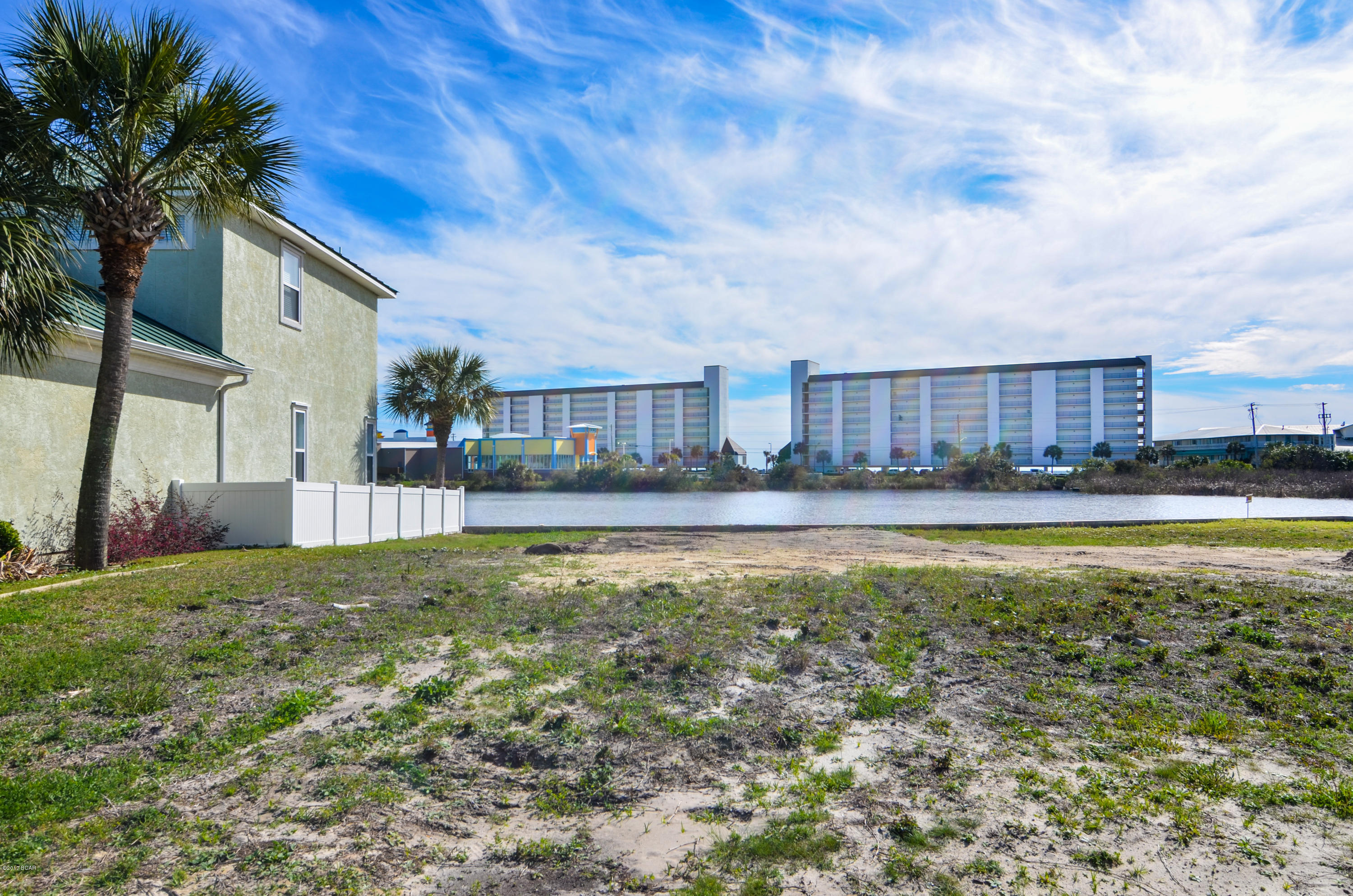 Looking for a great Lot close to Beach, golf cart friendly community where you can  build your Beach Bungalow or Custom Home? This lot gives you everything. Water views, proximity to beaches,  close to Pier Park, shopping and everything  Panama City Beach has to offer.