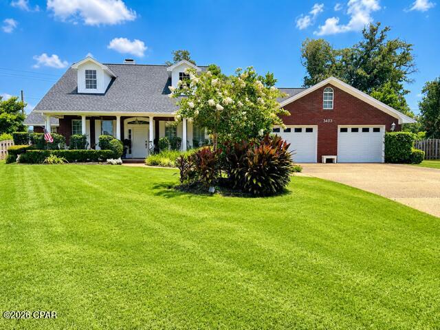 Beautiful all brick home nestled on the cul-de-sac of the Panama Country Club. This home offers 3 bedrooms and an office, all wood flooring throughout, renovated kitchen with solid surface countertops and stainless appliances.  Large family and formal dining rooms with custom lighting. Exterior features include oversized lot with screened in pool,  front and rear covered porches, sprinkler system and Generac Generator.