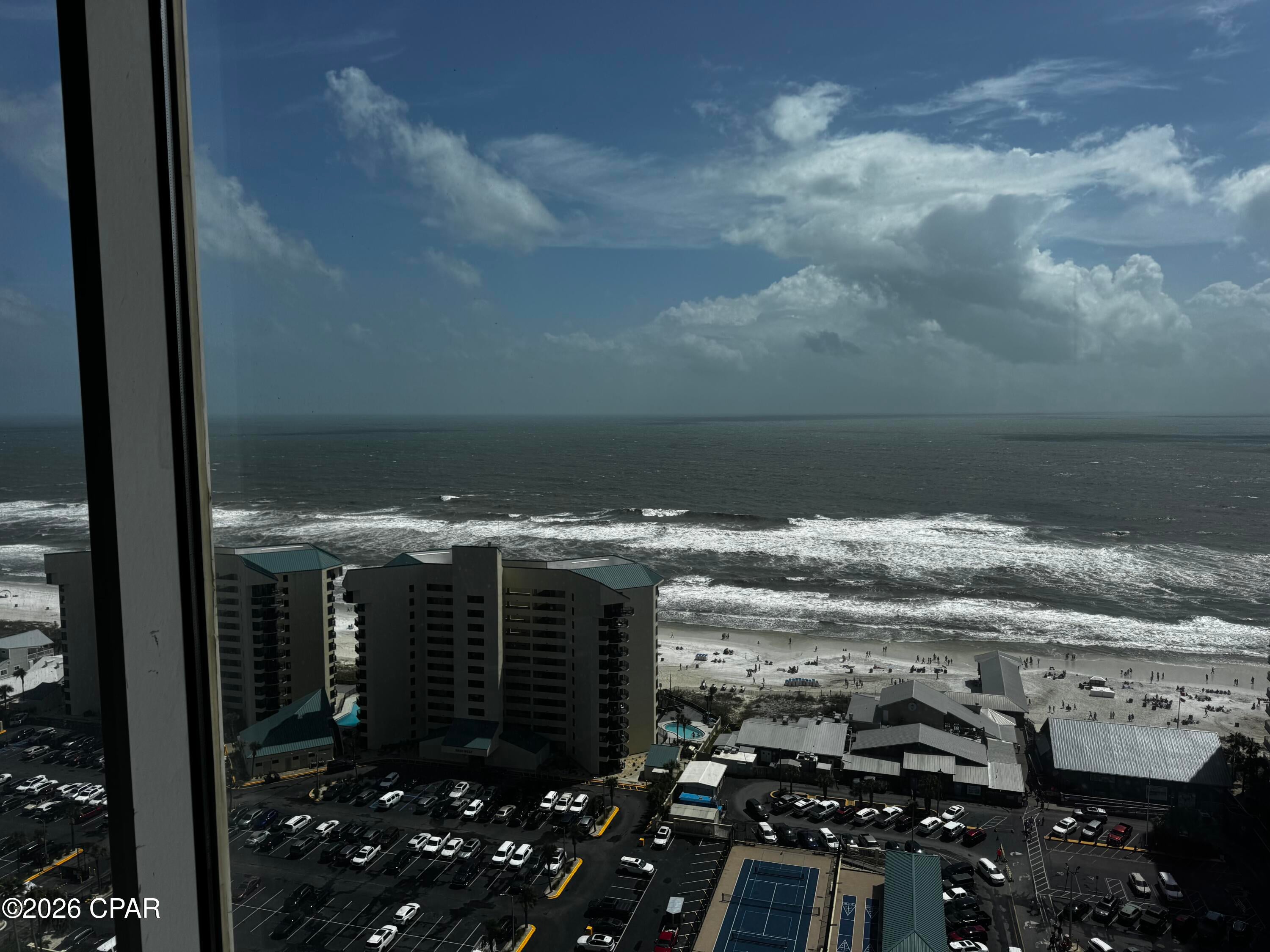 Great opportunity to own a unit that can be built out as commercial or residential. This unit is on the penthouse floor of a multi-use condominium building with exceptional views of the Gulf of Mexico. The multi-use condominium building houses 765 residential units and 35 retail/commercial units and is located across from Pineapple Willys. The unit already has plumbing, electrical and an HVAC. Don't miss out on this exceptional  opportunity.