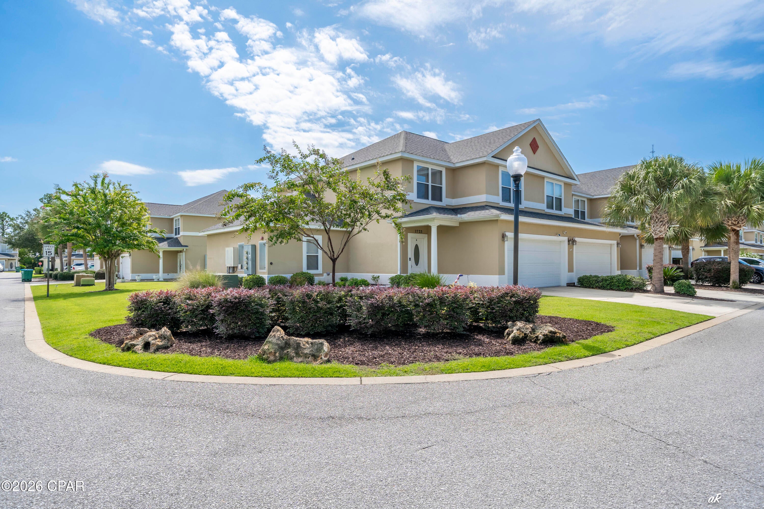 UNDER CONTRACT-TAKING BACK-UP OFFERS. Check out this beautiful corner townhouse on a corner lot in the desirable gated community of Annabella's Town Homes on the east end of Panama City Beach!

This spacious 4-bedroom, 3.5-bath unit features both upstairs and downstairs master bedrooms with en-suite bathrooms. It offers granite countertops in the kitchen and bathrooms, along with ample closet space featuring California Closet-style shelving. The first floor has tile and wood flooring, while the second floor is fully carpeted. For added protection, a fire suppression and sprinkler system is installed throughout all spaces--a feature very few units in the community have. The property also includes a large, finished 2-car garage, a new HVAC system installed in 2023, and a brand new double door leading out to the back patio. The exterior offers a large open patio with a water view. The community pool, clubhouse, and fitness room are also located conveniently close to the unit. Annabella's Community is in a prime location close to schools, restaurants, shopping, and just minutes away from the beach.

This is currently the lowest-priced 4-bedroom unit available in the community, so don't wait to schedule a showing. Come see your new home at Annabella's today!