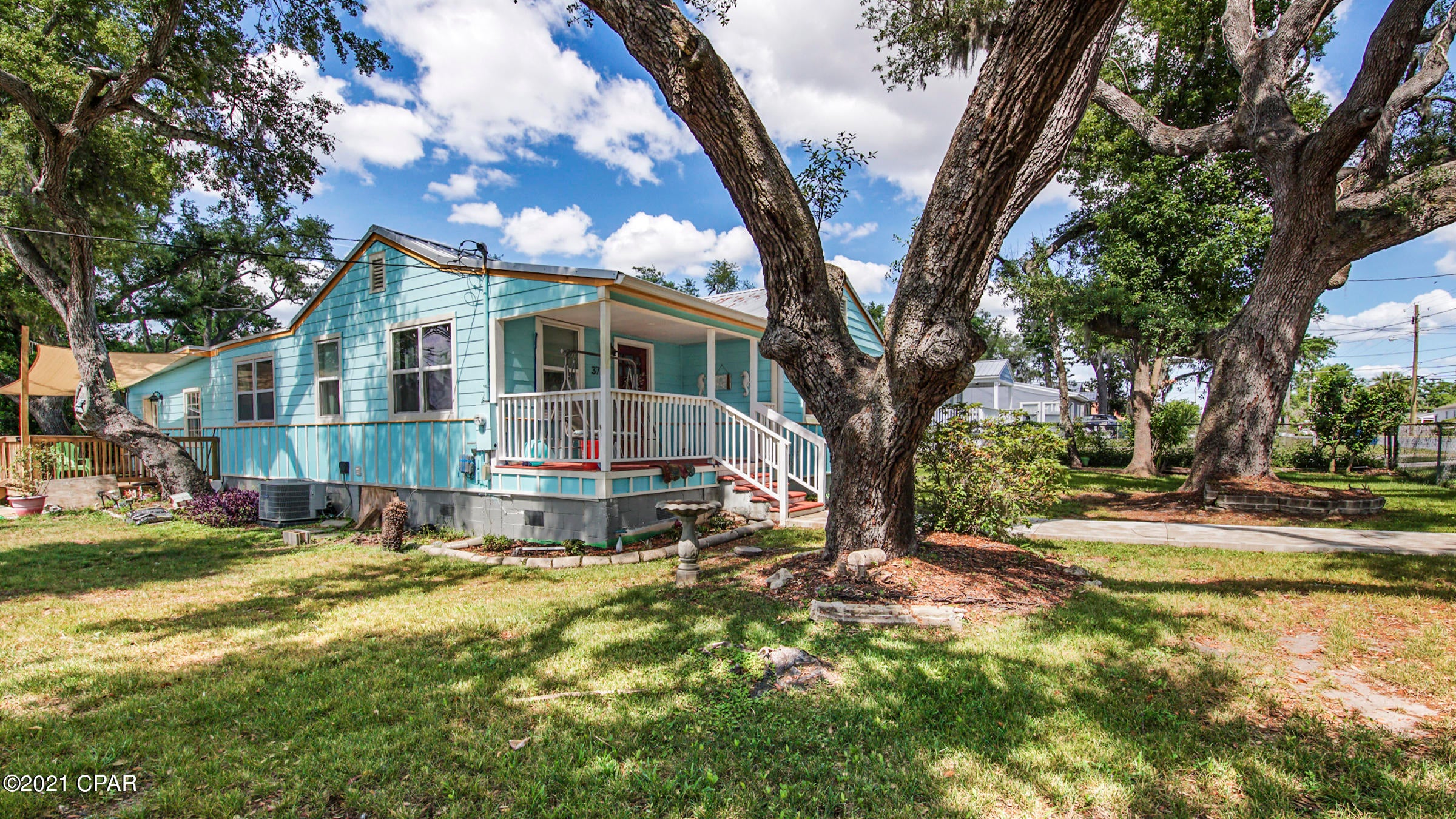 'CURRENTLY UNDER CONTRACT, SELLER ACCEPTING BACKUP OFFERS This cute Florida Cottage in St. Andrews has enough bedrooms for everyone!  Extra living area could be in-law suite as it has a separate large bedroom with walk in closet and large full bathroom attached, or make that your master Suite.  Lots of upgrades made to this property which include a new concrete parking pad, front sidewalk, new windows, privacy fenced back yard to include a 10x12  shed to keep all your yard tools and water toys in since you are a block from the water.   This house has been recently fully insulated to cut energy bills, and has had a new deck added. This house is a must see and cute as can be!