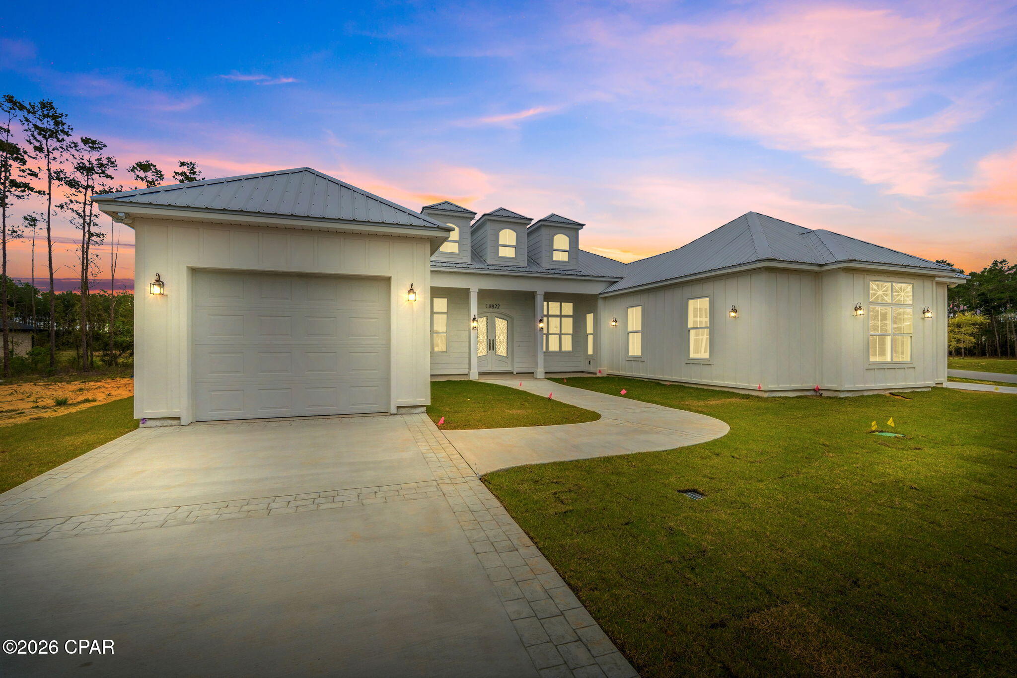 PRICE IMPROVEMENT! New price of $699,900!
NEW CONSTRUCTION CUSTOM-BUILT PROPERTY! Pool-ready backyard with electrical pre-wiring already in place, providing an excellent opportunity for you to custom design your future pool!

Step into this stunning 2026 custom-built home, perfectly situated on a serene 1.14-acre lot in the sought-after Bream Pond community of Panama City, featuring underground utilities. Designed for modern living with timeless elegance, this 3-bedroom, 3.5-bath residence offers an open, flowing layout with exceptional attention to detail.

The home welcomes you with striking iron French double doors, leading into a light-filled living space with beautiful views of the lanai and outdoor living area for your future pool and outdoor grill!

At the heart of the home is a gourmet kitchen featuring high-end KitchenAid appliances, including a French door refrigerator, microwave/oven combination, gas cooktop, and an industrial-grade range hood. The spacious design makes it perfect for cooking, gathering and entertaining.

Sunlight fills the expansive main living areas, creating a warm and inviting atmosphere throughout.

Each bedroom is generously sized, including a luxurious primary suite with spa-like features. The primary bath offers dual custom closets, dual vanities with a center seating space, and a convenient connecting door to the custom laundry room.

Enjoy the privacy and tranquility of over an acre of land--ideal for outdoor living, entertaining, or simply relaxing. The outdoor space includes two gas stub-outs for a future grill or fireplace, as well as a large storage room designed to accommodate future pool equipment. Existing pool equipment is already in place for a future pool installation.

Additional features include 8-foot arched doorways, bullnose-edge quartz countertops throughout, neutral LVP flooring, and thoughtfully selected finishes that create a cohesive and stylish design.

Key Features:

3 bedrooms | 3.5 bathrooms
2,690 sq ft living | 4,144 total under roof
Built in 2026 with high-quality, modern finishes
1.14-acre homesite, open-concept layout with gourmet kitchen,Luxurious primary suite with spa-inspired bath, located in Bream Pond, Bay County North!

Conveniently located just 18 miles to the international airport, 25 minutes to medical facilities near Hwy 79, and approximately 35 minutes to Pier Park for shopping, dining, and beach access. Scenic 30A destinations including Rosemary Beach, Seaside, and Alys Beach are just a 45-minute drive away. This property is situated near future development expected to bring additional residential growth, amenities, and conveniences to the surrounding area. Buyer to independently verify all development plans, timelines, and details with the appropriate governmental authorities.

Experience the perfect blend of privacy, comfort, and modern luxury! This new construction home is ready to welcome you.

*DISCLOSURE- ONE AI IMAGE UPLOADED TO SHOW FUTURE POOL/OUTDOOR/LANDSCAPING OPTIONS.

*No active HOA or board. Property may be subject to recorded covenants, conditions, and restrictions. Seller and listing agent make no representations regarding permitted use. Buyer to perform all due diligence regarding restrictions, zoning, utilities, and intended use.