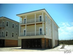 Fabulous Furnished Gulf Front Home offering 5 bedrooms and 4.5 baths with 3,666 SF living area, elevator, and hardiboard siding. Total 6,474 SF. 45' Deep Pilings, High Impact Low E Glass, Aluminum 25 Yr Roof. Granite Counters, GE Stainless Appliances, Can Lighting, Crown Molding and Security System. Tile Flooring with carpeted bedrooms. Spacious foyer area in center of home offering access to stairs and elevator. The possible 6th BR is a Media/Wet Bar/Office area located on top floor near Master Suite. The Second Floor has 10' ceilings and top floor 9' ceilings. Attic will hold same temperature as entire home. 2 Air Conditioning Units, 2 Washer/Dryer Hookups, 2 Hot Waters Heaters. Porches on all levels front and back. Sugar white fine sand, blue water, and a spectacular sunset