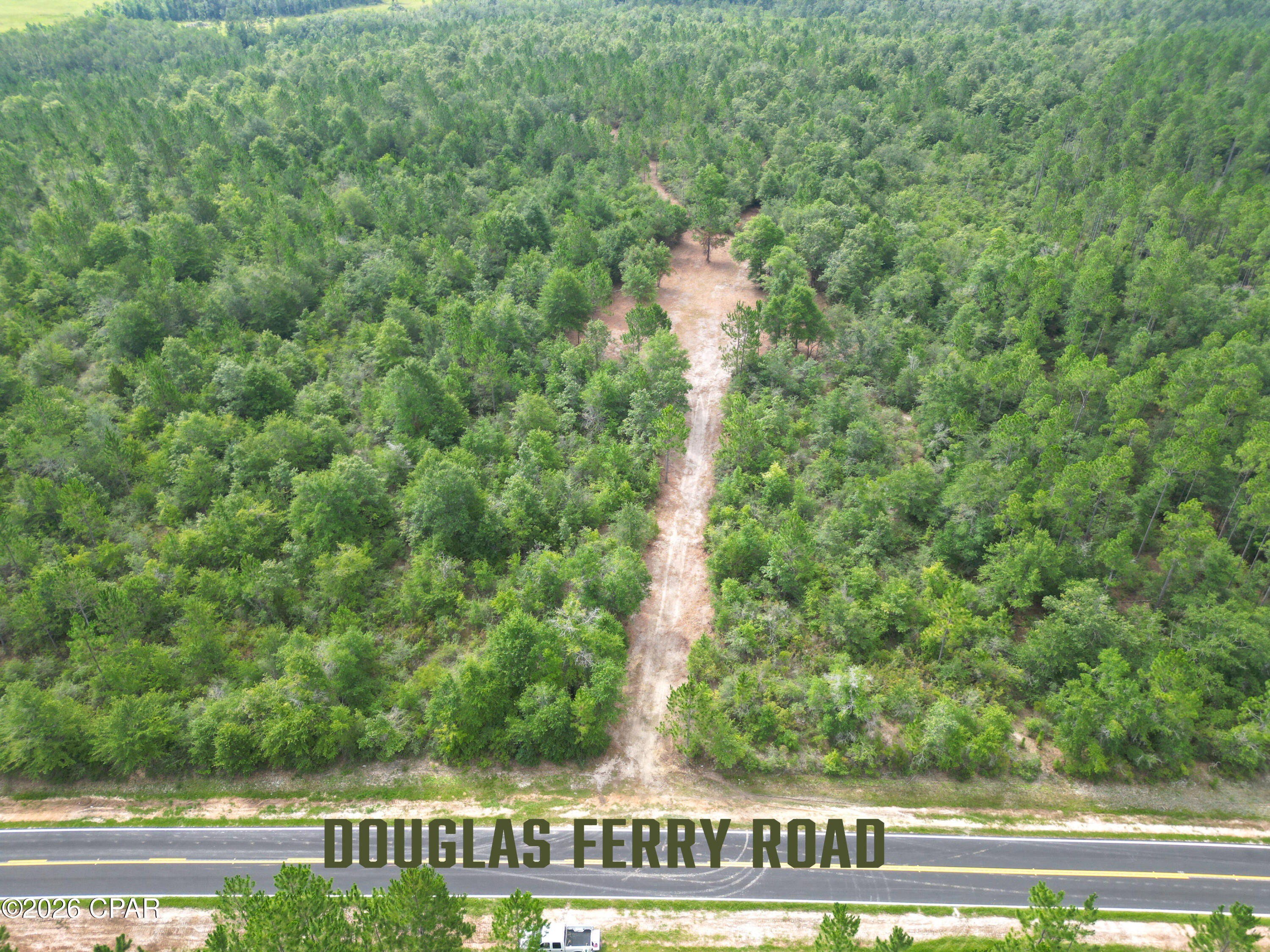Description: 
If you're looking for more than just another piece of land, you'll want to take a closer look at Lot 13 in Pine Ridge Estates. This high and dry 10 ± acre wooded parcel offers the ideal combination of privacy, natural beauty, and convenient access, making it an excellent place to build, invest, or simply enjoy the North Florida lifestyle. Pine Ridge Estates is a newly established acreage community in Washington County featuring homesites ranging from approximately 7 to 25.5 acres. Designed for those who appreciate open space and a slower pace of life, the community offers the opportunity to enjoy country living without feeling isolated. Here you'll find room to breathe, space to grow, and the freedom to create the lifestyle you've always wanted.
Lot 13 offers a partially cleared homesite, surrounded by mature pines and hardwoods that provide both privacy and natural beauty. Whether you're dreaming of building your forever home, starting a hobby farm, keeping a few horses, planting a garden, or simply having room to spread out and enjoy the outdoors, this property offers the flexibility you've been searching for. Deer, turkey, and other small game are frequently seen throughout the area, adding to the peaceful setting. Electricity is available at the road, making the property even more build-ready.
Conveniently located just 4.5 miles from Interstate 10 and 2.5 miles from Highway 79, the property offers easy access to nearby towns and amenities. You're only about 40 miles from Panama City Beach, where 27 miles of sugar-white sand, emerald-green Gulf waters, waterfront restaurants, shopping, entertainment, fishing, and boating make every visit feel like a getaway. Whether you're spending the day on the beach, enjoying fresh seafood, or watching the sunset over the Gulf, the coast is always within easy reach.
Outdoor recreation is one of the many reasons people are drawn to this part of North Florida. Spend your weekends exploring the crystal-clear waters of Cypress Springs on Holmes Creek, kayaking along Holmes Creek, fishing nearby rivers and lakes, or enjoying the area's many parks and wildlife management areas. Golf enthusiasts will appreciate being just 15 miles from the future Old Shores community--an exciting new destination planned to feature a world class golf course. As this premier development takes shape, homeowners at Pine Ridge Estates will be conveniently located to one of Northwest Florida's most anticipated new recreational spots while still enjoying the peace and privacy of country living.
Owning acreage is about more than where you live--it's about how you live. It's having the freedom to build the home you want, enjoy the outdoors, and appreciate a little extra space. Whether you're putting down roots, creating a weekend retreat, or investing in your future, Lot 13 offers an opportunity to enjoy the best of North Florida. 
Additional homesites are available in Pine Ridge Estates, with parcels ranging from approximately 7 to 25.5 acres. Discover the freedom of owning acreage in one of North Florida's most beautiful settings--where peaceful country living and outdoor adventure come together. Call today for more information.
Key Features:
• Existing cleared homesite
• Paved frontage on Douglas Ferry Road
• Mature pines and hardwoods
• Abundant deer, turkey, and other native wildlife
• Electricity available at the road
• Ideal for a custom home, mobile home, or hobby farm
• Approximately 4.5 miles to Interstate 10
• Approximately 2.5 miles to Highway 79
• Approximately 10 miles to Cypress Springs on Holmes Creek
• Approximately 15 miles to the future Old Shores community
• Approximately 40 miles to Panama City Beach