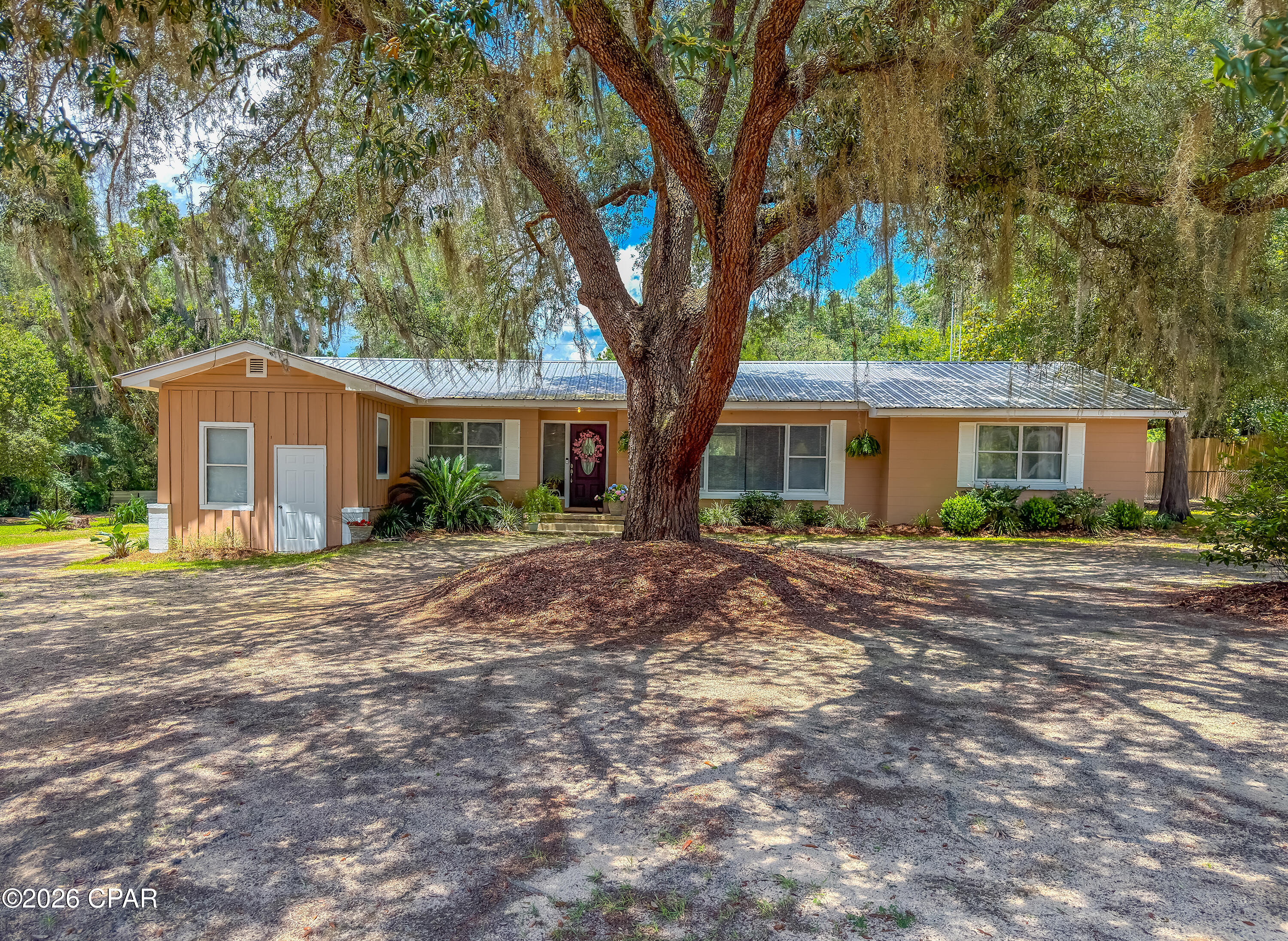 CURRENTLY UNDER CONTRACT, SELLER WILL CONSIDER BACKUP OFFERS

If extra space and flexibility are high on your wish list, this property deserves a closer look. Situated on approximately 7.37 acres in Bristol, Florida, this property features a 3-bedroom, 1-bath block home with approximately 1,831 square feet of living space, plus a separate 2022 manufactured home offering 2 bedrooms, 2 bathrooms, and approximately 888 square feet.

The additional manufactured home offers flexibility for a variety of living arrangements, guests, or other personal uses. Its back deck overlooks a small pond, creating a relaxing place to enjoy your morning coffee or unwind after a long day.

The acreage provides plenty of room for gardening, outdoor activities, equipment, hobbies, or simply enjoying the peaceful country setting. Conveniently located about an hour from Panama City, Mexico Beach, Tallahassee, Florida, and Dothan, Alabama, you'll enjoy the privacy of country living while remaining within easy reach of shopping, dining, healthcare, and the Gulf Coast.

Properties offering approximately 7.37 acres, a block home, and a separate 2021 manufactured home are not often available. With room to enjoy the outdoors, additional living space, and the flexibility that comes with two residences, this property offers a unique opportunity for a variety of lifestyles and needs.