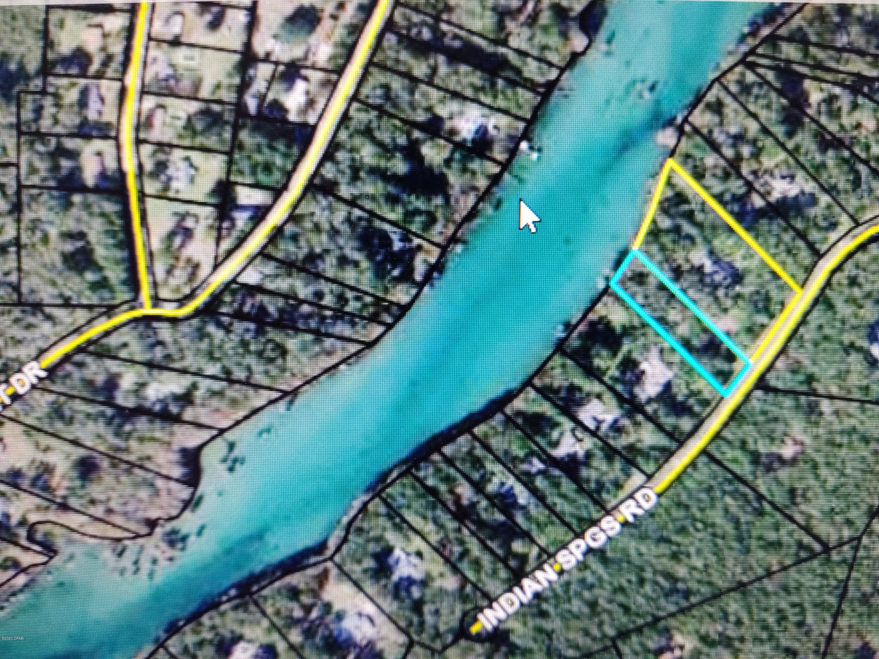 2 ACRE WATERFRONT LOT ON MERRITT'S MILL POND.  One of the most beautiful, and usable lots on the entire lake, with a gentle slope all the way from the road to the waters edge.  Easy to build on, and easy to construct docks and access roadway to the lake if needed or desired.  Access is by paved street in a beautiful waterfront and golf community.  City Water and Sewer is available at the street, and there is already a pad for home or outbuilding construction.  Merritt's Mill Pond is actually part of the Spring Creek  System that flows out of five Magnitude 1 Springs , which pump 80 Millions gallons of clear, pristine water each day into the lake and further into the Chipola River.  The lake is inhabited by World Record Redeared Sunfish, huge Black Bass, and large schools of huge Bluegills. The large underwater caves formed by the spring waters are World Famous destinations for cave divers.  The clear and cool lake waters are perfect for swimming, skiing, boating and kayaking year round! For More Information on this beautiful lake and it's many varied attractions, See: Life on Merritt's Mill Pond, a Public Facebook Site.  You will be thrilled to live on this wonderful paradise!

This residential waterfront parcel is situated between two very nice homes in the subdivision, so you will know up front how the adjacent property will look now and in the future.  The parcel has a current survey as well.