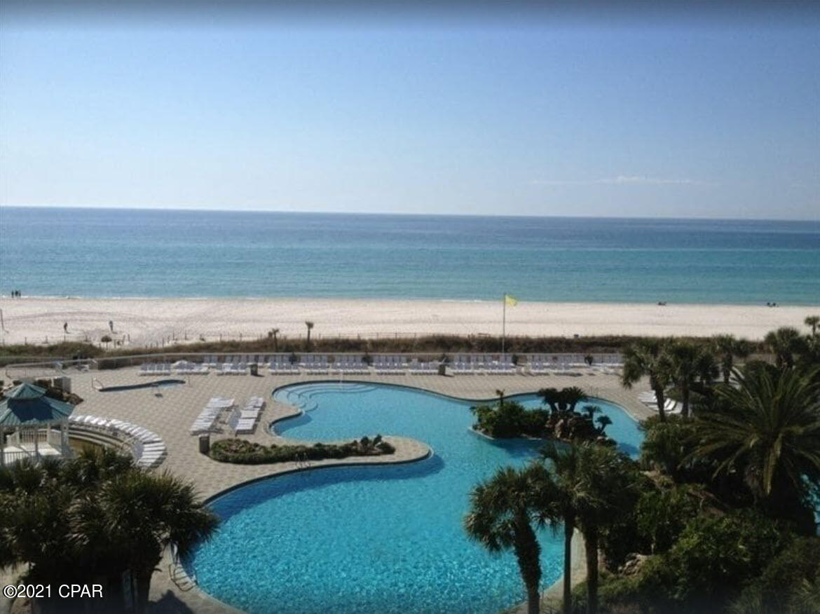 A RENTAL BEAST - This beautiful condominium is located in Tower I, the most requested tower at beautiful Edgewater Beach and Golf Resort. You are looking at a gorgeous 5th floor Gulf front condominium at Panama City Beach's ONLY Gulf front Resort. Bask in the sun on your large balcony overlooking the tropical lagoon pool, sugary white sands and the emerald blue waters of the Gulf of Mexico. This condo boosts many features including a extremely large with over 1000 square feet of living area. The massive master bedroom suite and the living area both open onto the gulf front balcony. You will find everything up to date, including granite countertops, updated cabinetry, crown molding, ceiling fans, tile flooring in the kitchen, hallway and bathrooms with carpet in the bedroom... Edgewater offers numerous amenities which includes golf, tennis, pro shop, exercise facility, restaurant, market, 11 swimming pools whirlpools, 24 hour security, gated entrance and much more.