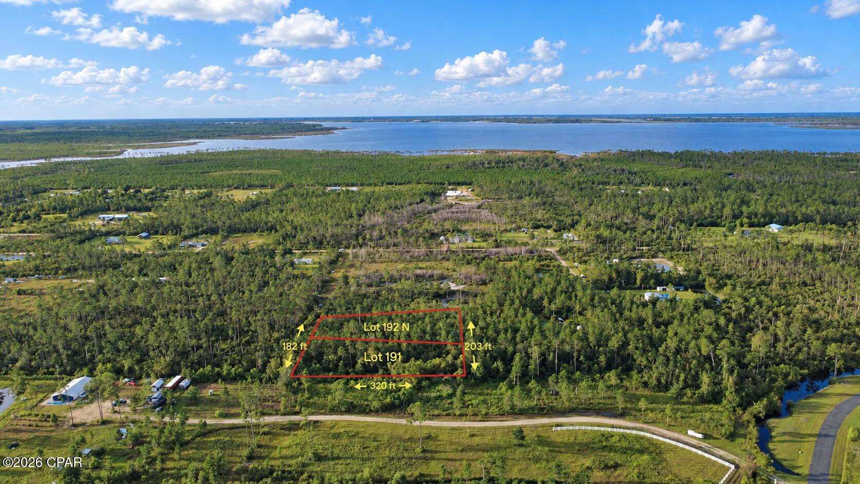 Two adjoining parcels totaling approximately 1.4 acres offer an affordable opportunity to create a private homesite in eastern Bay County. 

Lots 191 and 192N are being sold together and back up to the Sandy Creek Ranch subdivision. No HOA and zoned for single-family residential use, the property provides plenty of space to enjoy the natural surroundings while designing a home that fits your vision. 

Electric is nearby, and a well and septic system will be needed. Don't miss this opportunity to own a spacious piece of Bay County!

All lot lines shown in photographs are approximate and are provided for illustrative purposes only. All information should be verified by the buyer if deemed important.