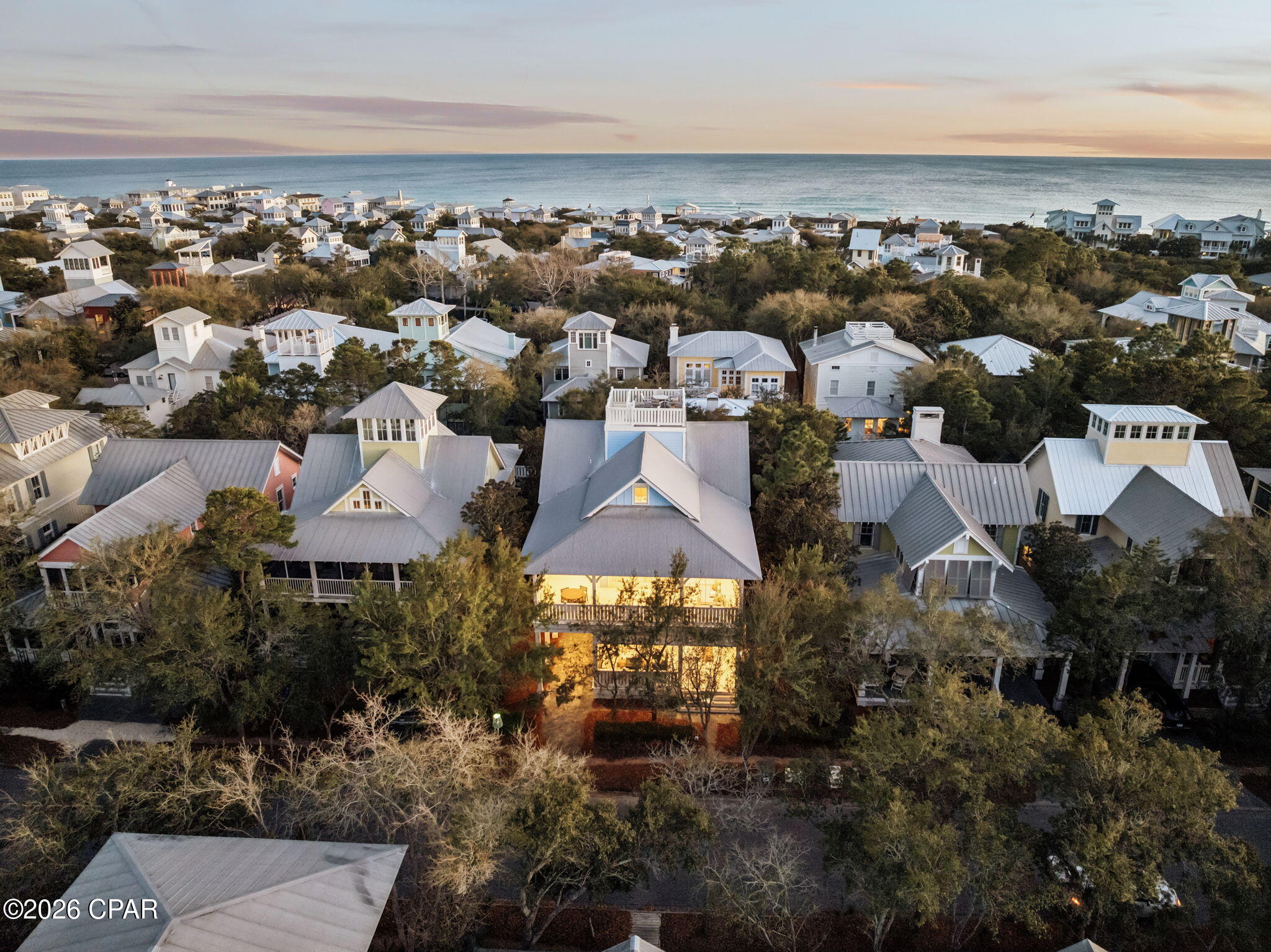 Exceptional Gulf-View Residence in Prime WaterColor Location

Ideally situated just two blocks from the beach on a quiet street, this 5-bedroom, 5.5-bath WaterColor home offers rare elevated Gulf views, strong rental performance, and extensive recent upgrades. Positioned among the highest vantage points in the community, the property captures sweeping views of the Gulf, Seaside, and surrounding coastal landscape, highlighted by a rooftop deck designed for sunrise and sunset enjoyment.

The home features multiple indoor and outdoor living spaces, including expansive porches, a private rear deck with gas fire pit and grill, and a rooftop terrace with panoramic sightlines. 

The kitchen is well-appointed with Sub-Zero refrigeration, Wolf appliances, an oversized island with seating, and custom cabinetry by Smallbone of England. Interiors were professionally designed by Beau Interiors and are offered furnished (with exclusions).

Recent improvements include new electrical throughout, new decking, recessed lighting, one new HVAC unit, new window treatments, new hot water heater, paved driveway, and updated marble surfaces in the kitchen. 

The backyard faces toward Seaside and the Gulf, and a contractor has verified space for a potential pool installation. Located within close proximity to the Truman House and in one of WaterColor's most desirable rental areas, the property has generated approximately $175-200K annually in gross rental revenue over the past two years.

Buyer to verify all information and dimensions.