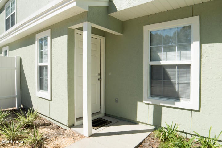 Two Bedroom Two Bathroom town-home style duplex. Freshly painted with tile downstairs and new carpet upstairs. Washer and dryer hookups upstairs, large partially fenced shared back yard. One year lease and $1100 security deposit required as well as a credit check with a minimum 600 credit score. One dog with breed and size restrictions will be considered on a case by case basis with a non-refundable $250 pet deposit and an increase of $25 in monthly rent. No cats.