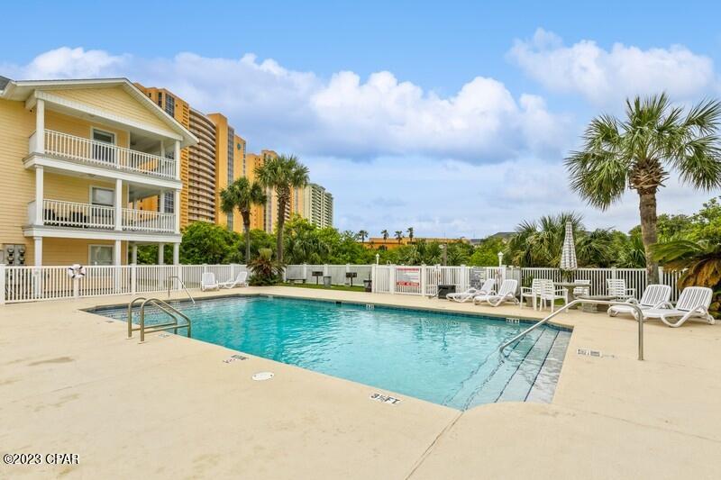 'CURRENTLY UNDER CONTRACT, SELLER WILL CONSIDER BACKUP OFFERS'.  Turnkey ready directly across the street from the beach!  Stainless appliances, vinyl plank flooring, sleeps 6!  Completely renovated and updated!  Roof was replaced in 2022.  Park directly in front of your unit.  Conveniently located on the west end of PCB just a short drive to 30A and the airport!  Make this your second home or a great way to break into the investment​​‌​​​​‌​‌​​​​‌​​‌​​​​‌‌ business!