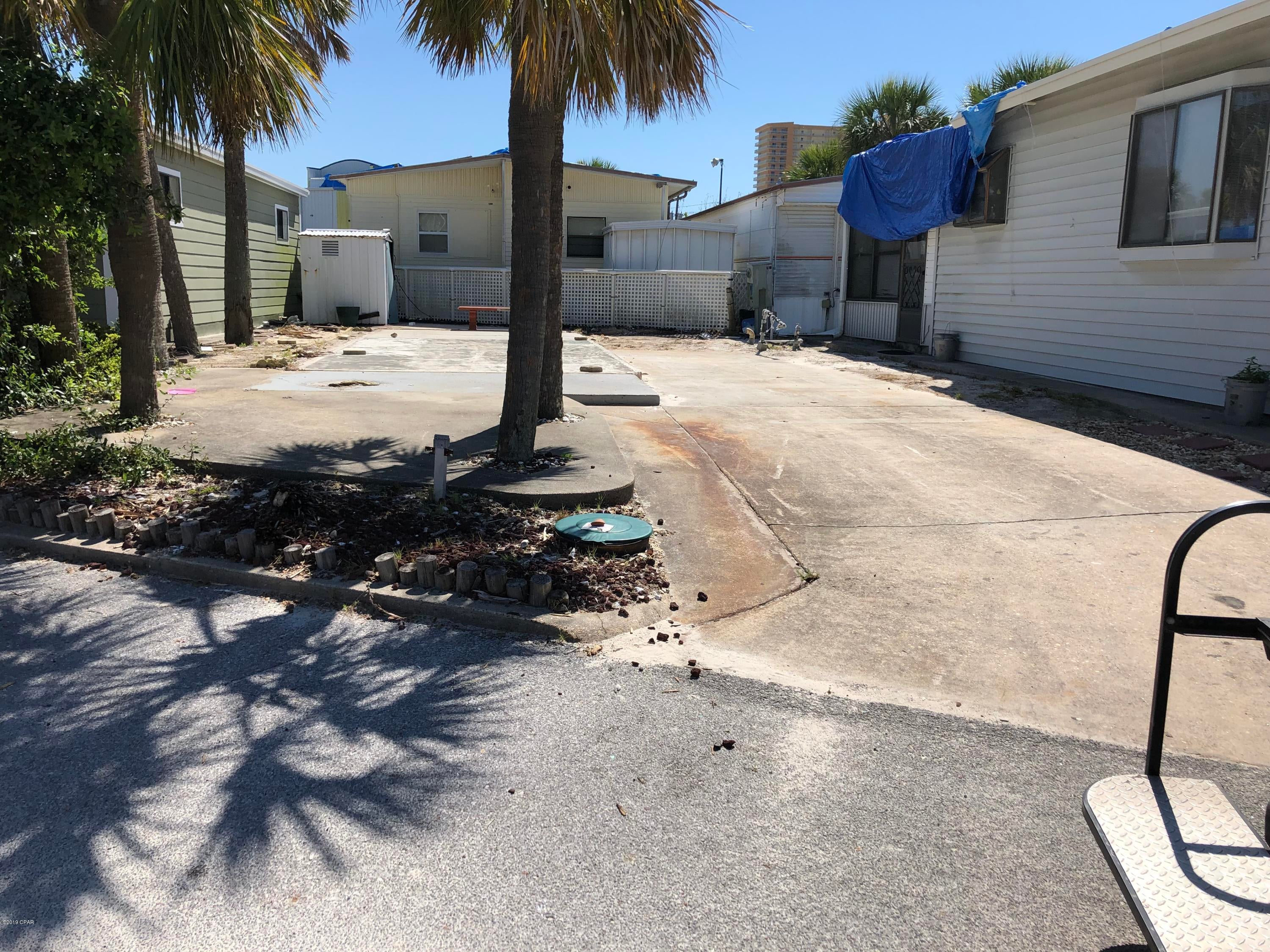 GREAT OPPORTUNITY TO HAVE AN RV LOT FOR RENTAL OR BRING IN YOUR OWN! VENTURE OUT OFFERS 2 POOLS, TENNIS AND PICKLE COURTS, PLAYGROUND, GAZIBO, PAVILLION, BASKETBALL COURTS, SHUFFLEBOARD, BBQ AND PICNIC AREAS, FULL TIME SECURITY AND WE ARE A GOLF CART COMMUNITY! OUR BEAUTIFUL BEACH IS RIGHT ACROSS THE STREET!