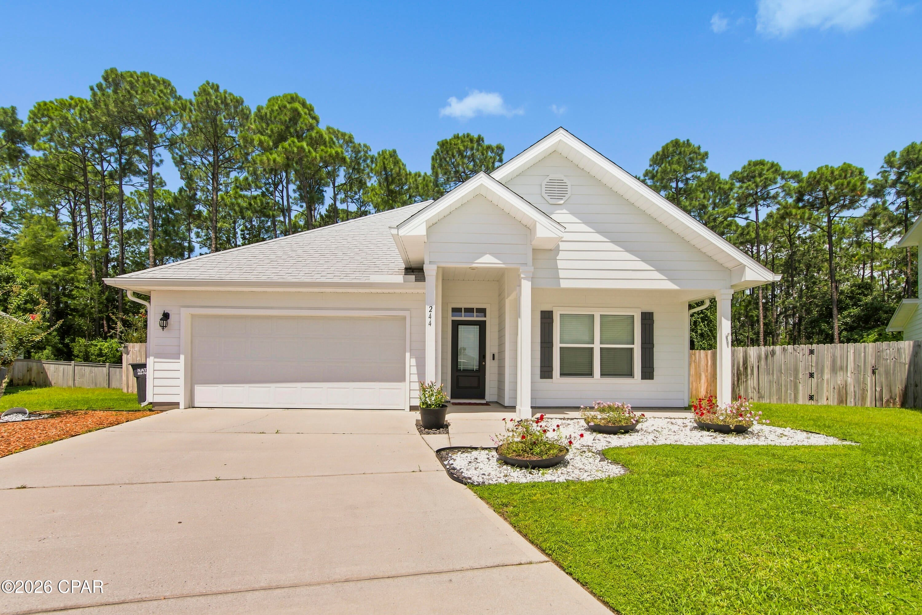 CURRENTLY UNDER CONTRACT, SELLER WILL CONSIDER BACKUP OFFERS.
This spacious one story 4 bedroom, 2 bath home in Panama City Beach is ready for its new owner. Open layout, split floor plan, covered back porch & additional patio area to enjoy the outdoor Florida lifestyle. Freshly painted inside & brand-new carpet in all of the bedrooms. The kitchen offers a large island, solid surface countertops & a walk-in pantry with custom shelving.  Spacious master bedroom with a tray ceiling and a view out to the woods. The master bathroom has 2 sinks, custom shelving in the walk-in closet & a separate soaking tub and shower.  The other 3 bedrooms are well sized and offer great flexibility whether used as a bedroom, study, gym, playroom or guestroom.  Custom shelving system in 2 of the other bedrooms and the utility room. Normally garages are not that exciting but check out this one! Look at the storage system on both sides of the garage while still leaving room for two vehicles to park in the garage. Located on a cul-de-sac street in a community with sidewalks, streetlights & a dog park. This home backs up to the woods for privacy and a peaceful view. Full yard sprinkler system & fenced in backyard. Built in 2020 you will have the peace of mind of owning a nearly new home.  Just 4 short miles away from this Coastal Florida home are white sandy beaches & turquoise blue waters. Make sure you add this home to your must-see list today!