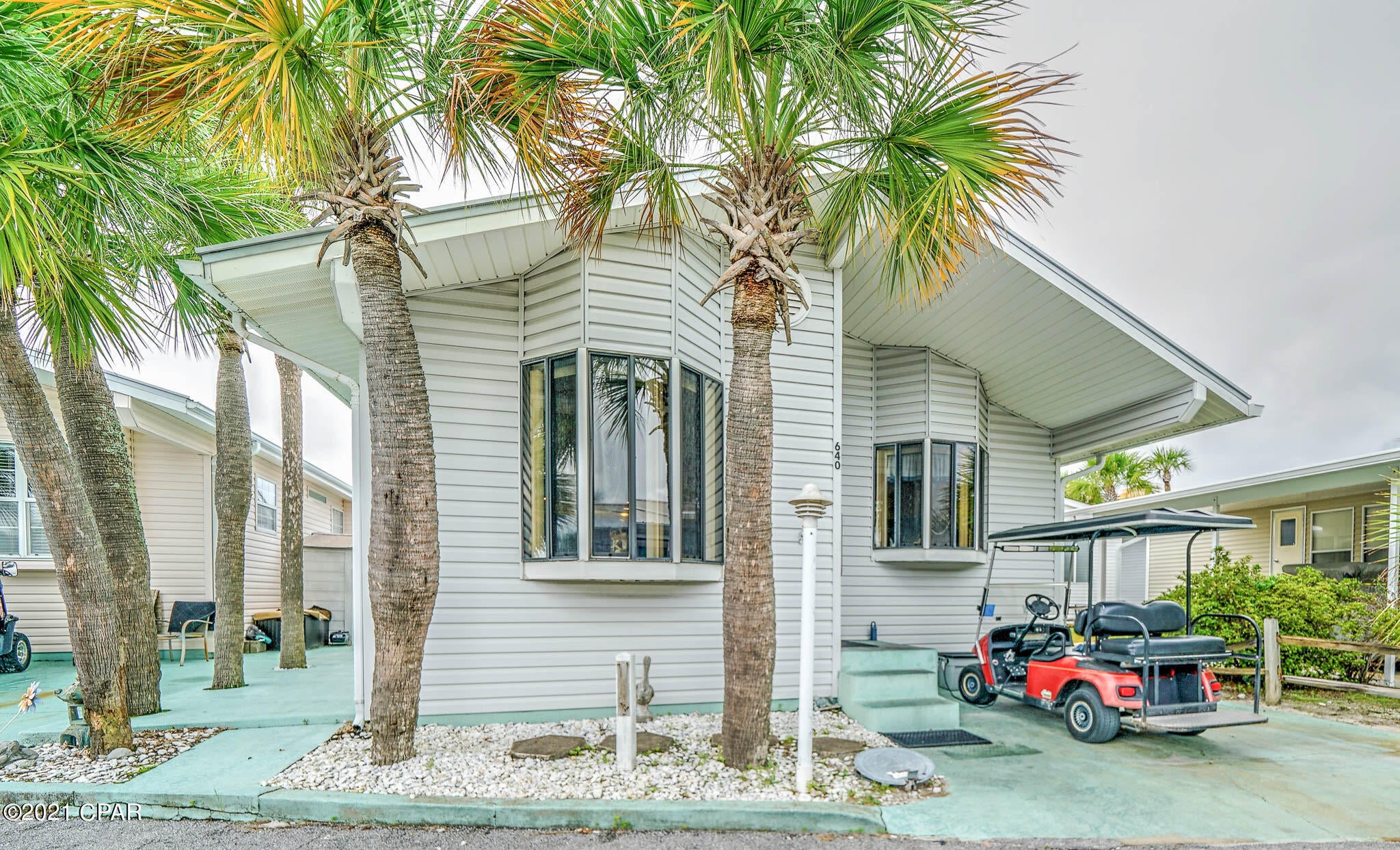 .CURRENTLY UNDER CONTRACT, SELLER ACCEPTING BACKUP OFFERS - The wait is over, you found your new beach house! Check out this darling 3 bedroom 2 bath Venture Out home. This stunning home has large rooms and flows beautifully. The location is fantastic within the resort. Great potential here for investment or 2nd home! Venture Out is a golf cart community that has exploded with popularity recently... With 300' on the beautiful pristine beaches of the Gulf of Mexico and 1,000' on the Grand Lagoon. Venture Out has something for everyone. With 2 pools, fishing pier, boat ramp, mini golf, children's play ground and much much more!