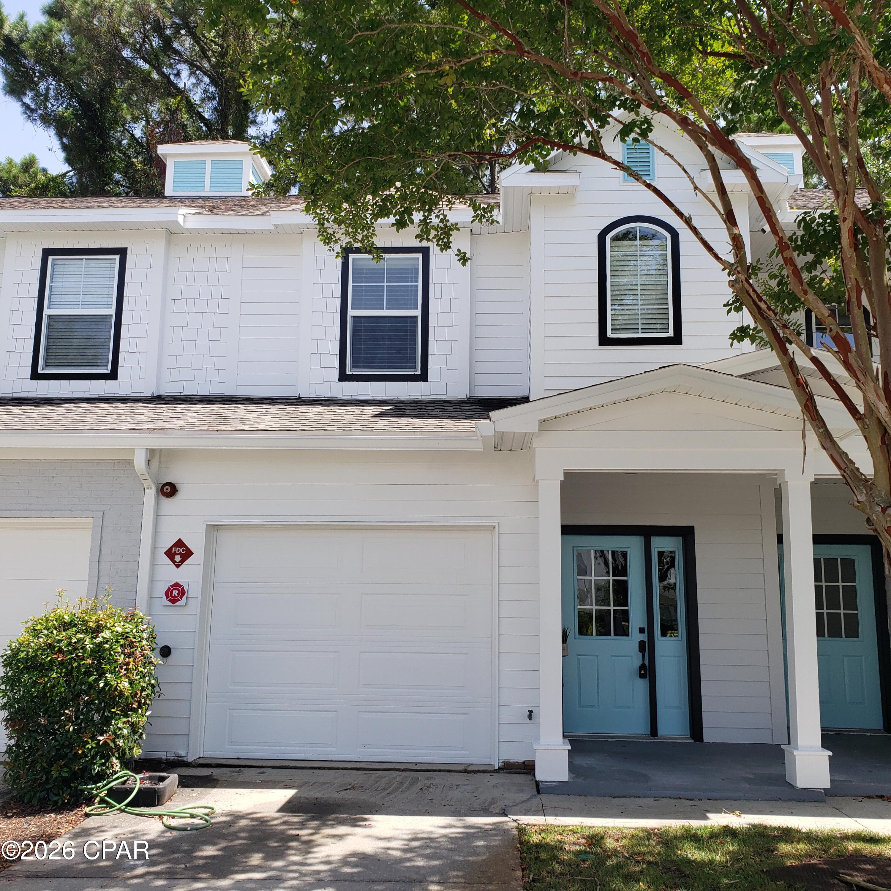 Beautifully maintained 2-bedroom, 2.5 bath townhome-style condo WITH a private garage in the gated Emerald Park community of Panama City Beach. 
Designed for comfortable living and effortless entertaining, this home features an open-concept floor plan with the kitchen overlooking the main living area. The kitchen offers granite countertops, ample cabinetry, a breakfast bar, and a pantry for added storage. A convenient half bath on the main level is perfect for guests, while the covered back patio provides a relaxing outdoor retreat.
Upstairs, the spacious primary suite includes a walk-in closet, dual granite-topped vanity, and private shower. The second bedroom also features its own en-suite bath with a tub/shower combination, offering privacy and comfort for family or guests.
Seller is offering a home warranty for added peace of mind. 
The HOA covers water, trash, Wi-Fi, and landscaping, making for truly low-maintenance living.
Residents of Emerald Park enjoy an impressive collection of resort-style amenities spanning more than 12,000 square feet of thoughtfully designed indoor and outdoor spaces. Community features include a resort pool and sun deck with Jacuzzi, a secondary quiet pool, outdoor lounges, covered loggias with an outdoor kitchen, a private dining room with catering kitchen, a 24/7 fitness center, a 2,500-square-foot co-working center, dog park, clubroom with fireplaces and TVs, coffee bar, game room with pool and ping-pong tables, indoor children's playroom, and additional shaded outdoor gathering areas.
Ideally located just minutes from the white-sandy beaches of Panama City Beach, as well as shopping, dining, entertainment, and grocery stores, this property offers the perfect blend of convenience and coastal living.
Whether you're looking for a primary residence, vacation home, or investment opportunity, this exceptional property is ready to exceed expectations.
All measurements are approximate and should be verified by buyer if important.