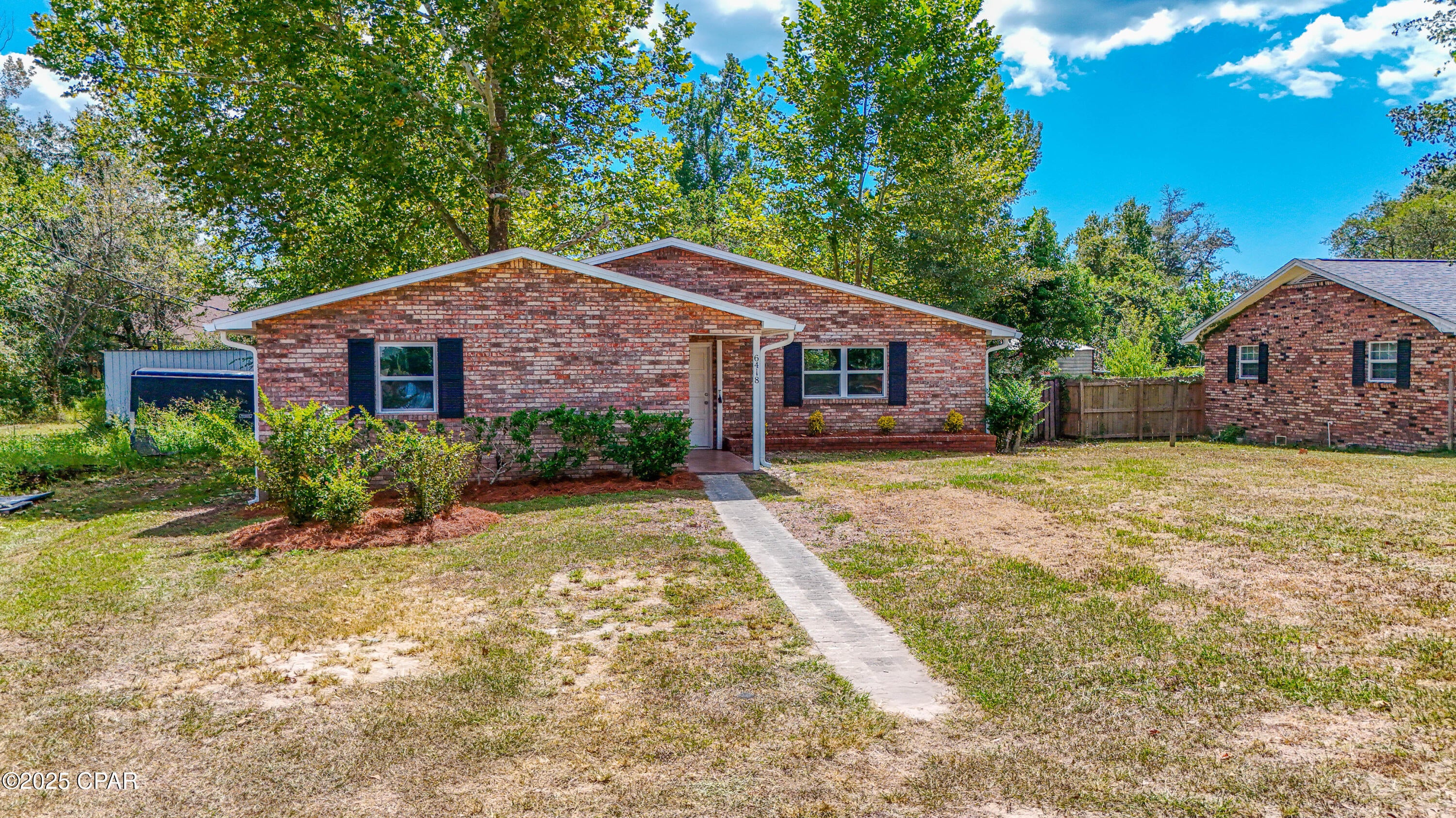 Back on the market at no fault of the seller!

Completely Remodeled All-Brick Home on Canal - Two Master Suites! Welcome to 6418 Zinnia Street - a beautifully renovated 3-bedroom, 3-bathroom all-brick home that offers comfort, space, and water access! Featuring two master suites, this thoughtfully updated property is perfect for multi-generational living, hosting guests, or simply enjoying extra space and privacy. Every inch of this home has been completely remodeled from top to bottom. Updates include: • New roof (post-Hurricane Michael) • New energy-efficient windows • All new flooring • Fully updated bathrooms • Modern kitchen with new appliances • Fresh interior & exterior paint • Updated plumbing throughout. New pressure tank and water treatment system for the well. 
Located on a small, quiet canal that leads directly to Deer Point Lake This home is conveniently situated just 20 minutes to Tyndall Air Force Base and only 10 minutes to 23rd Street shopping, dining, and amenities. Don't miss your chance to own this move-in ready gem in a great Panama City location. Schedule your private showing today!