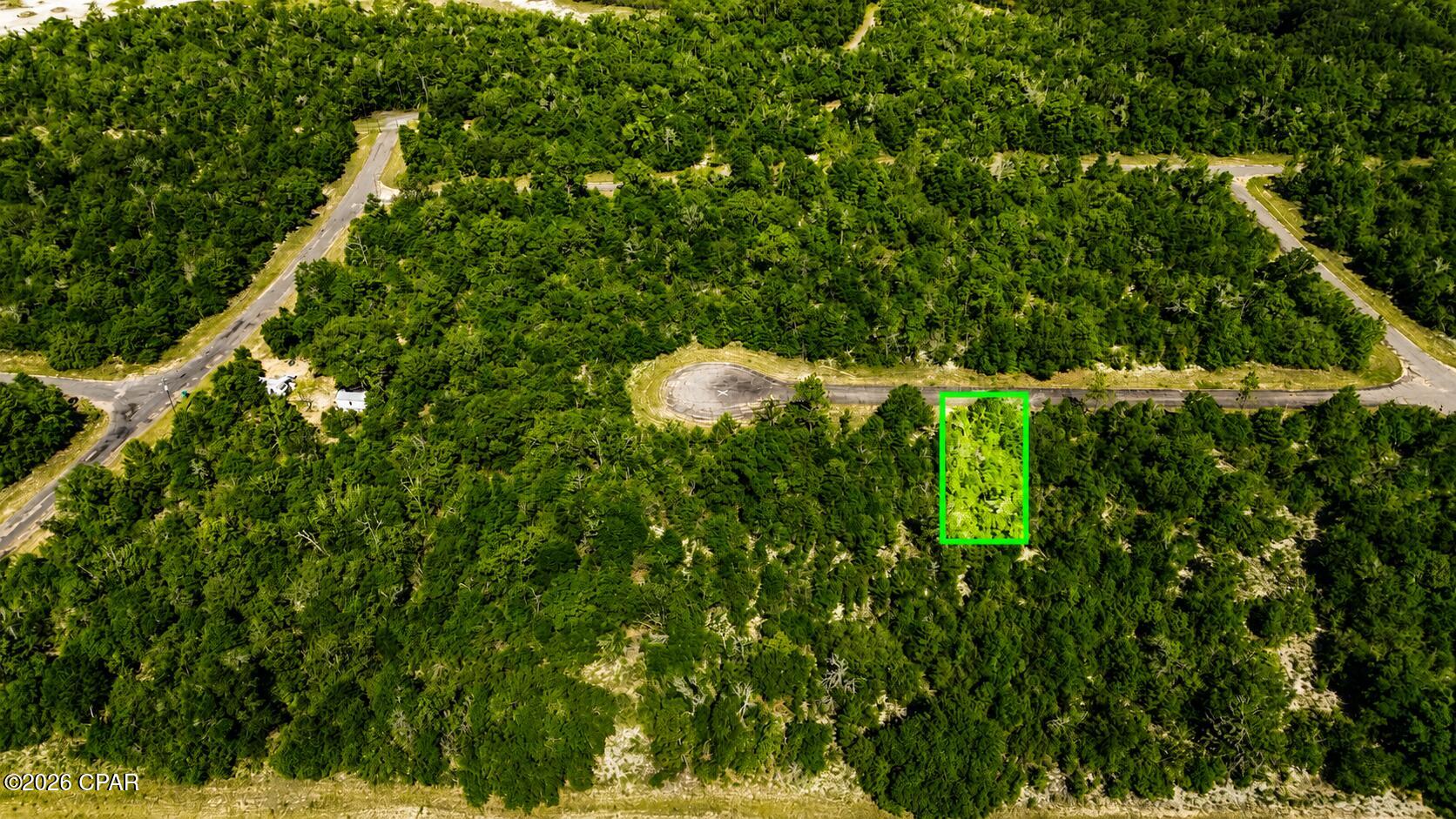 Build now or invest for tomorrow with this beautiful wooded homesite located on Hale Court in the desirable Sunny Hills subdivision. Situated near the end of a peaceful cul-de-sac, this property offers the perfect combination of privacy and convenience.

Enjoy the relaxed lifestyle Sunny Hills is known for, featuring an award-winning golf course, freshwater lakes, parks, and abundant outdoor recreation--all while being just a short drive from Panama City, the world's most beautiful beaches, and local shopping and dining.

Whether purchased on its own or alongside the neighboring lot for additional space and privacy, this property offers endless possibilities. With no HOA and plenty of room to create your own vision, this is an opportunity you won't want to miss.