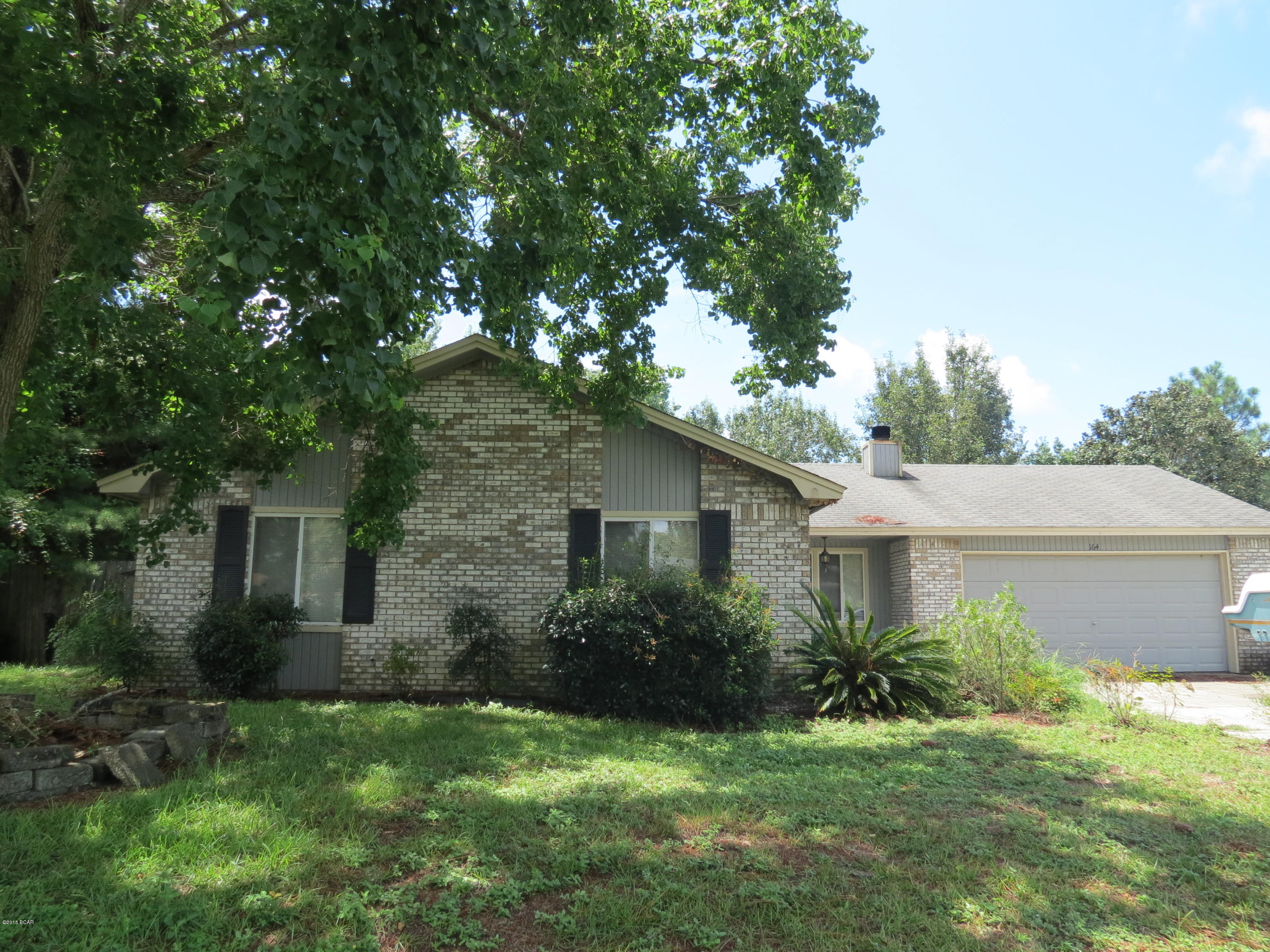 Beautiful 4 bedroom, 2 bath home that is centrally located in Panama City Beach, in a very nice neighborhood.  Open floor plan with fireplace and inground pool w/ water feature. The home needs cosmetic repairs and appliances. With a little TLC, this home would be a great investment property or perfect for a family. Put this on your list of properties to see today!