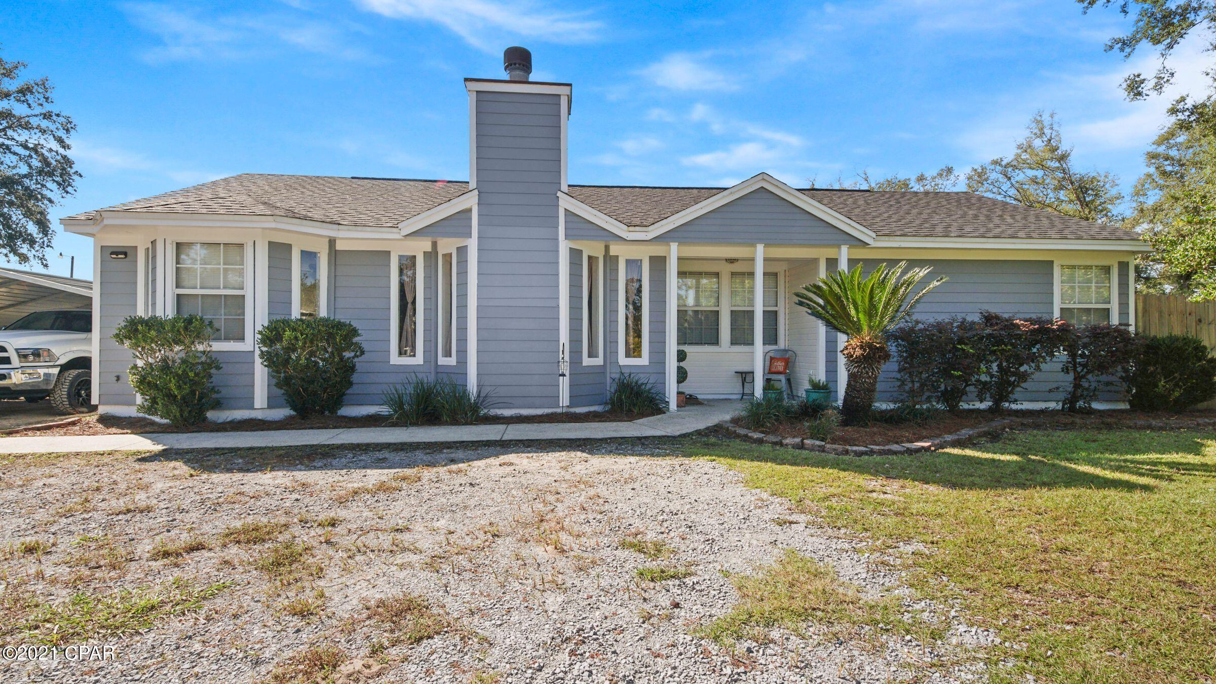 Looking for an adorable 3 bed 2 bath home in the country, not too far from town This home has laminate flooring throughout, spacious rooms and is on .688 acres, This is what you need! Adorable hardi board sided home with New roof with a huge pole bard/ work shop with car lift already installed. there is plenty of space here, you can store your boat your RV what ever you need. Has access from back of the property as well.