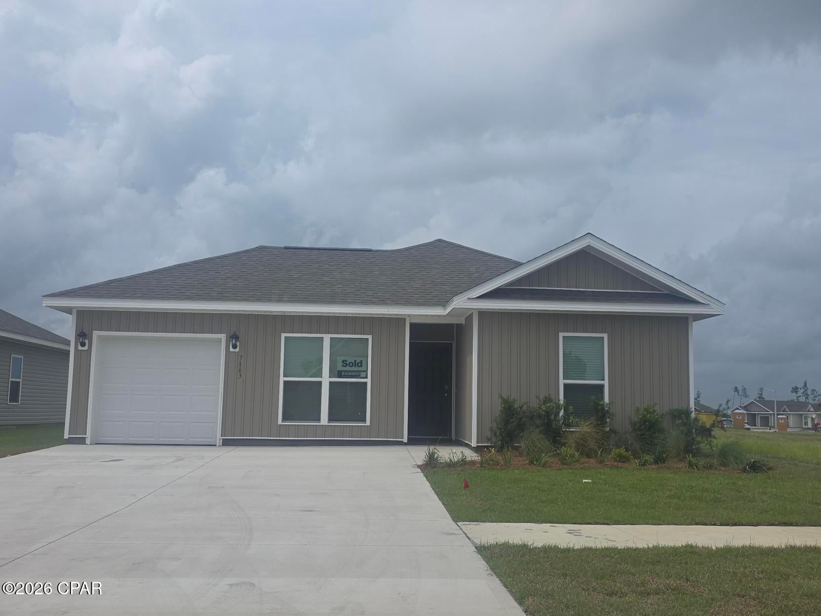 Welcome to the Sutton Plan, one of our new plans at Liberty in Panama City, Florida. The Sutton is a spacious single-story home with 1,439 square feet of comfortable living. This beautiful home offers 4 bedrooms with 2 bathrooms, and a 1-car garage. As you enter the home, the foyer welcomes you with beautiful EVP flooring which spans throughout the home in the main areas and bathrooms. Right by the front door are the 3 guest bedrooms, a full bathroom, and down the hallway is the laundry room and storage area leading into the kitchen and living room. Each bedroom boasts plenty of space and sizeable closets for organization with soft carpet flooring.

The kitchen is equipped with beautiful granite countertops, stainless steel appliances, and beautiful white cabinetry. The pantry is located next to the laundry room across from the linen and coat closets. Natural light illuminates this main area for your family and friends to enjoy. The back yard features a back patio located by the primary bedroom and the dining area. The spacious primary bedroom features its own bathroom complete with granite countertops, a large walk-in closet, and a relaxing shower. Both bathrooms feature beautiful granite countertops and white cabinetry. In addition to all the features and amenities our Sutton plan offers, each is built with our Smart Home technology package, designed to bring the ease and convenience of life right to your fingertips.

On the outside of this popular plan, you will see durable vinyl siding, a rear patio to enjoy the spacious back yard. Sidewalks line the neighborhood streets for you to enjoy the beautiful Florida weather. Our Liberty community features underground utilities making it less susceptible to damage from severe weather leading to fewer outages and more reliable service. Residents of Liberty can enjoy exclusive access to two amenity centers, complete with two pools, a children's splash pad, two playgrounds for endless fun, a well-equipped fitness center, two pickleball courts and a basketball court to name a few things. To learn more about this home for yourself, call us to get connected today!