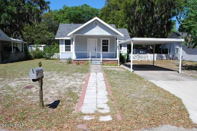 Charming Cove home just minutes from the Panama City Marina  and Civic Center. Great location close to all the nightlife and fantastic restaurants in the downtown area. The Cove is the perfect neighborhood for your daily activity of walking, running or cycling. This home features original hardwood floors, updated lighting, kitchen with gas cooktop and self-cleaning oven. There is a good-sized back porch, fenced back yard with a storage shed. Dogs are allowed with approval and fee; breed restrictions apply.