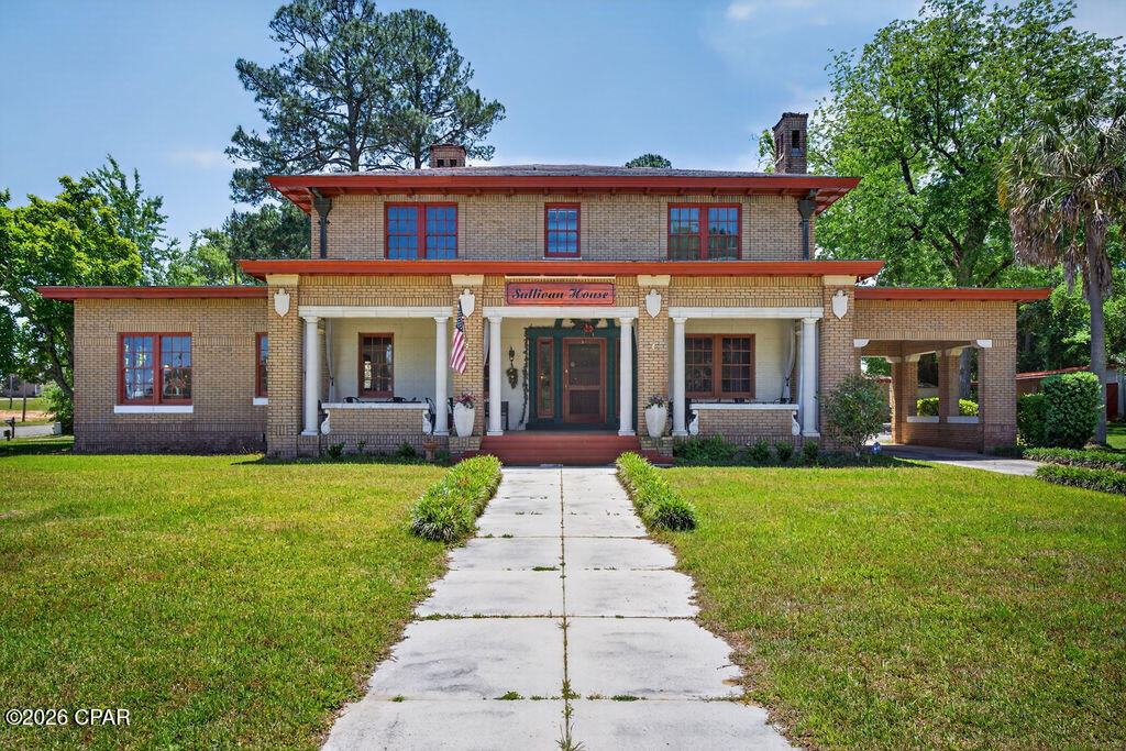 Step into a rare and distinguished opportunity with the The Sullivan House Bed & Breakfast--a property rich in history, character, and income-producing potential. Originally rooted in the 1880s and thoughtfully rebuilt after a fire, this remarkable estate has served four generations and is currently operating as a successful bed and breakfast. Modeled after a South Florida home inspired by Cuban architecture observed in the 1920s, the residence blends timeless design with modern functionality.

Spanning nearly 6,000 square feet, the primary home features 6 bedrooms and 3.5 bathrooms, offering ample accommodations for guests or private use. Interior highlights include cedar-lined closets and six fireplaces (four coal-burning and two wood-burning), creating an atmosphere of warmth and historic charm. The expansive downstairs layout is ideally suited for hosting and events, comfortably accommodating gatherings of up to 50 guests across three main entertaining spaces--an exceptional asset for weddings, corporate retreats, or special occasions.

From an operational standpoint, the property is well-equipped to support continued hospitality use or adaptive commercial ventures. Recent updates include a new roof in 2025, central HVAC installed in 2023, a hot water heater replaced in 2023, and electrical and plumbing upgrades completed between 2023-2025. Modern conveniences such as a 50-amp RV hookup, Level 1 and Level 2 electric vehicle charging stations, and a five-car garage enhance both guest experience and owner flexibility. Above the garage, a charming carriage house offers additional income potential or private quarters, complete with 1 bedroom and 1 bathroom.

Additional highlights include a basement ideal for storage or flexible use, a separate outdoor wash house for added convenience, and a rare outdoor concrete block safe--providing a unique and secure solution for storing valuables.

Whether continuing its legacy as a bed and breakfast, transforming into an event venue, or reimagining it as a boutique inn or retreat center, this property offers a unique blend of history, scale, and commercial viability.

This is more than a property--it's an established destination with deep roots and limitless potential.