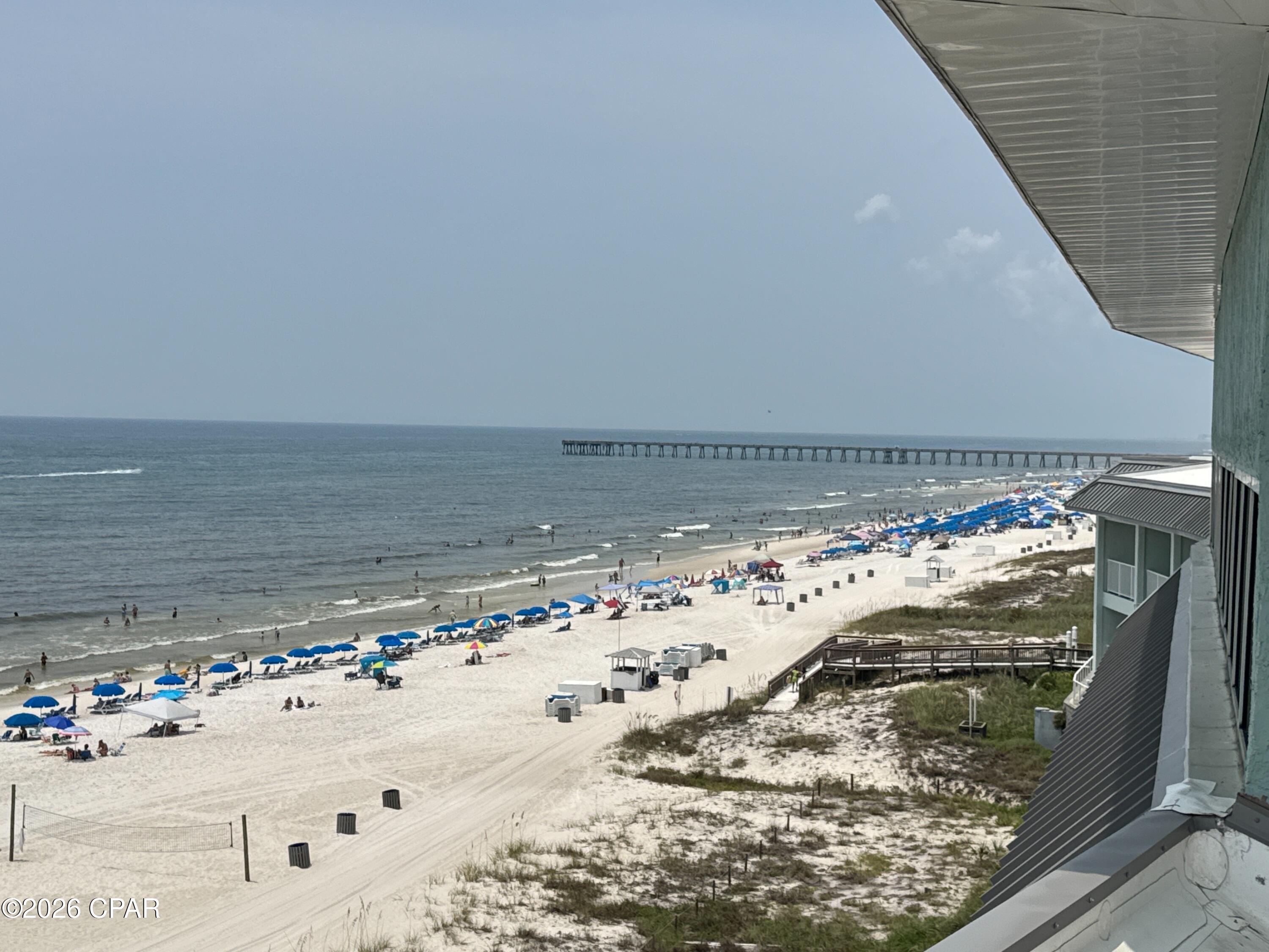 PENTHOUSE LEVEL, END UNIT ..  OVER $60k INCOME IN 2026.  Inside - this condo has been completely remodeled.  Outside -  the Milestone Inspection structural repairs were successfully completed and certified by a licensed engineer.   ROOFTOP BALCONY.  New flooring, both bathrooms remodeled, kitchen remodeled.    NO UPSTAIRS NEIGHBORS.  True All-Inclusive HOA ($2,200/mo): Covers electricity, high-speed internet, cable TV, water, sewer, building insurance, property management, and groundskeeping. 
Scheduled Price Drops: HOA Dues to decrease to $2,000/mo in January 2027, and should drop by an additional $800/mo in 5 years!
100% Structural Peace of Mind: Milestone passed; brand new TPO roof/mansard, elevators, railings, walkway coatings, and sealed parking garage are fully completed and paid for.