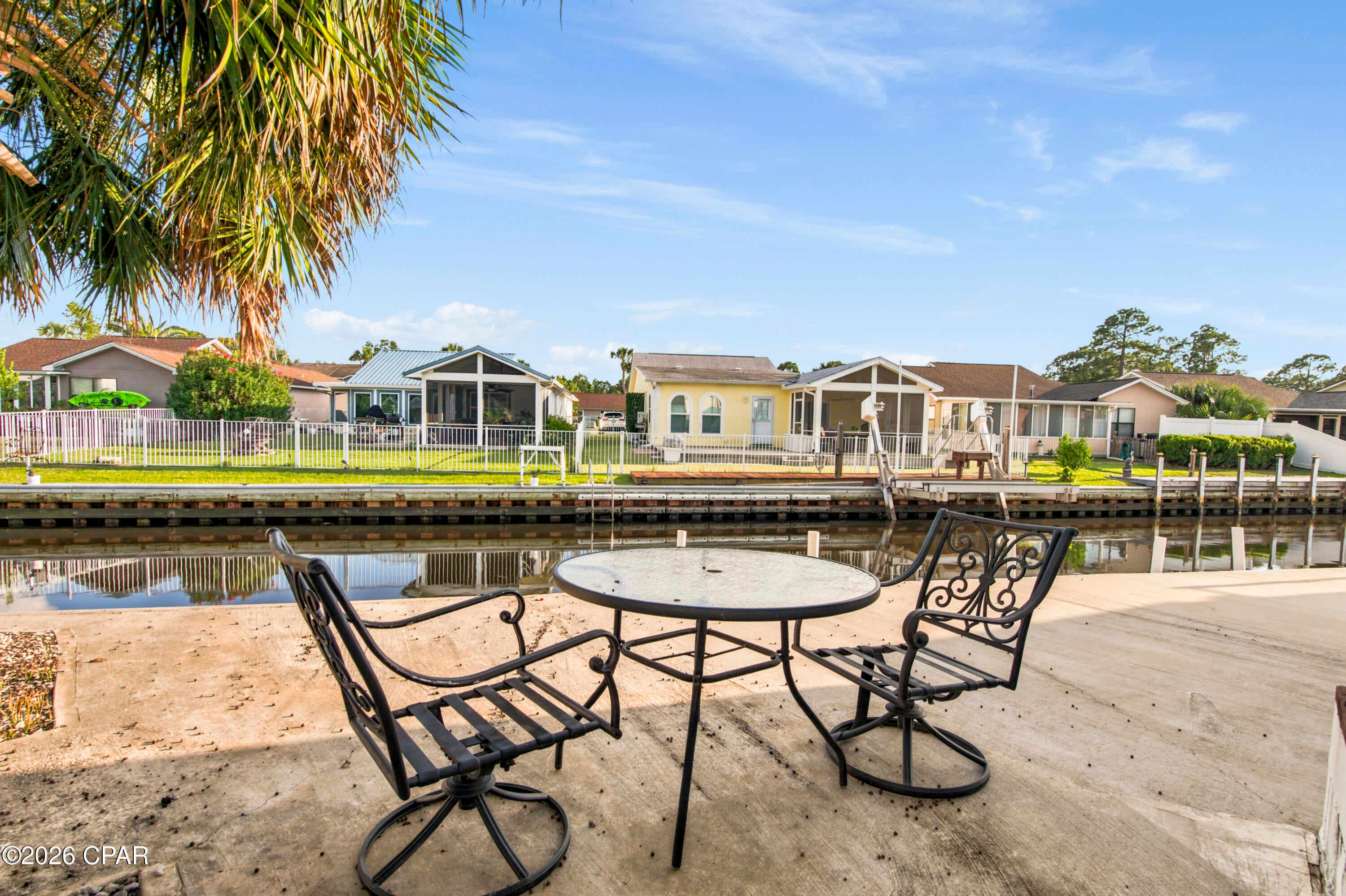 LOCATION, LOCATION, LOCATION! Welcome to your waterfront gateway in Panama City Beach! This beautifully refreshed 4-bedroom, 2-bath   offers the Emerald Coast lifestyle you've been waiting for, with direct Gulf access right from your backyard and no HOA fees.

The home has been thoughtfully updated with  LVP flooring, attractive countertops, and more, creating a fresh, comfortable space that is move-in ready. The spacious, sun-filled kitchen is perfect for everyday living or entertaining.  

Boaters will love the deep canal and private waterfront access, allowing you to dock your boat right outside your home and reach the bay and Gulf waters in minutes.  There is a full-service marina conveniently located at the end of the canal for additional boating needs.

With over 1,500 square feet, generous parking for at least four vehicles, and space for RVs, this property offers plenty of flexibility for family, guests or renters. Sold furnished and ready to enjoy as a primary residence, second home, or vacation rental, this is a property with exceptional possibilities.

Whether you're looking for your own coastal retreat, a boating enthusiast's paradise, or an investment opportunity, this waterfront gem deserves a look. Come see it and experience the Emerald Coast lifestyle for yourself!