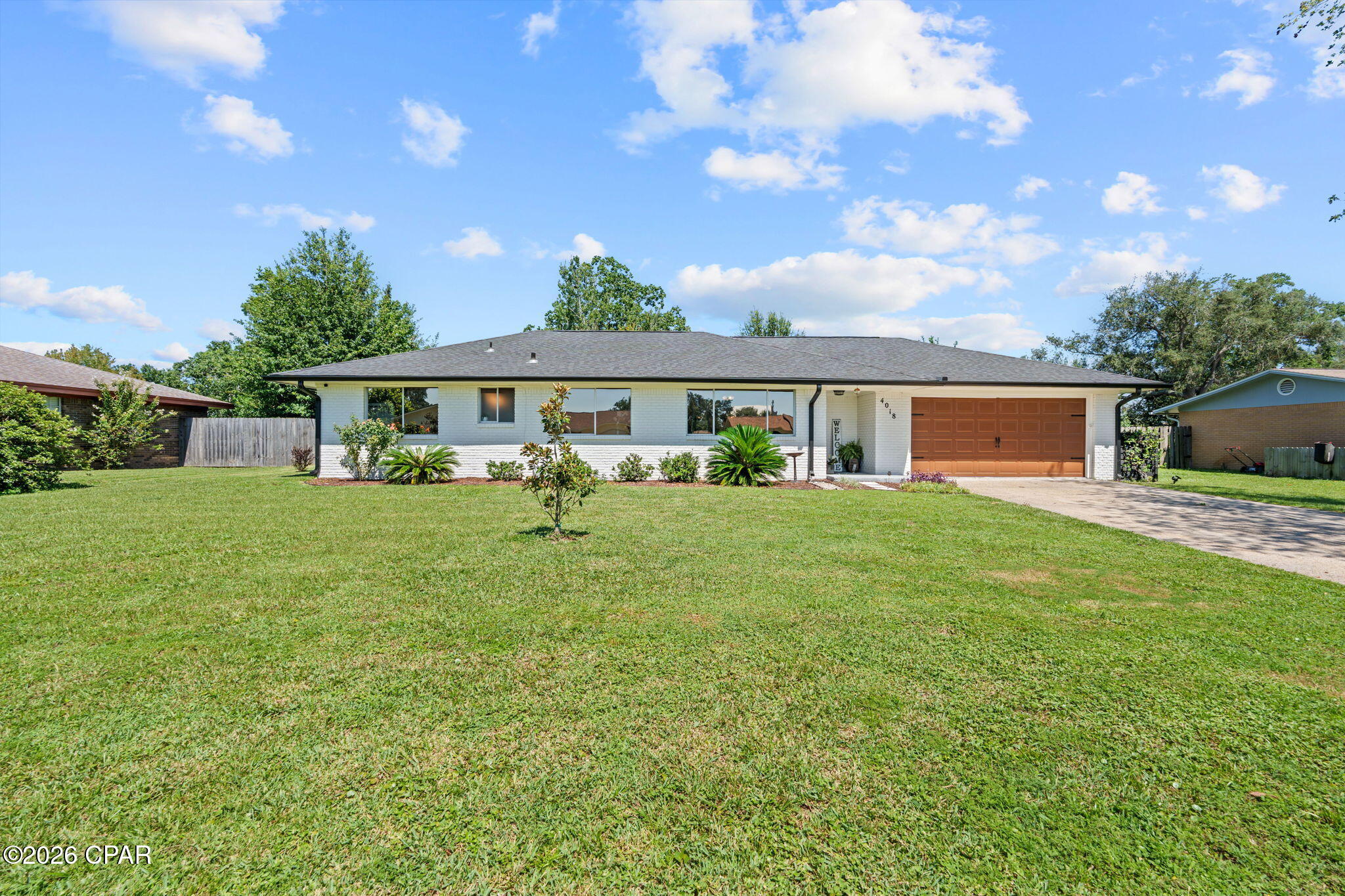 Welcome to this beautifully updated 4-bedroom, 3-bath brick home, perfectly situated on a quiet dead-end street in the desirable Venetian Villas community near North Bay. Offering over 2,000 square feet of comfortable one-level living, this home features an open, spacious floor plan designed for both everyday living and entertaining.

The updated kitchen is the heart of the home with rich wood cabinetry, granite countertops, a stylish subway tile backsplash, stainless steel appliances, and a breakfast bar accented by pendant lighting. Fresh interior paint, luxury vinyl plank flooring throughout, updated LED lighting, and ceiling fans give the home a modern, move-in-ready feel.

The spacious primary suite is a true retreat, featuring an oversized bedroom with plenty of room for a sitting area, home office, workout space, or even a private nursery for a growing family. The updated en-suite bath offers modern finishes, creating a comfortable space to unwind at the end of the day.

The additional bathrooms have also been renovated with new vanities and fixtures, with two featuring beautifully tiled tub/shower surrounds. Just off the living area, the 240-square-foot covered sunroom provides the perfect place to relax while overlooking the large, privacy-fenced backyard .

Situated on nearly a quarter-acre lot, you'll also enjoy being within walking distance of Venetian Sunset Park, where you can take in breathtaking sunsets over the bay. Major updates include a new roof (2023) and new HVAC system (2023),  gutters (2026), blinds (2026), tinted windows (2025), shed (2026), providing peace of mind for years to come.