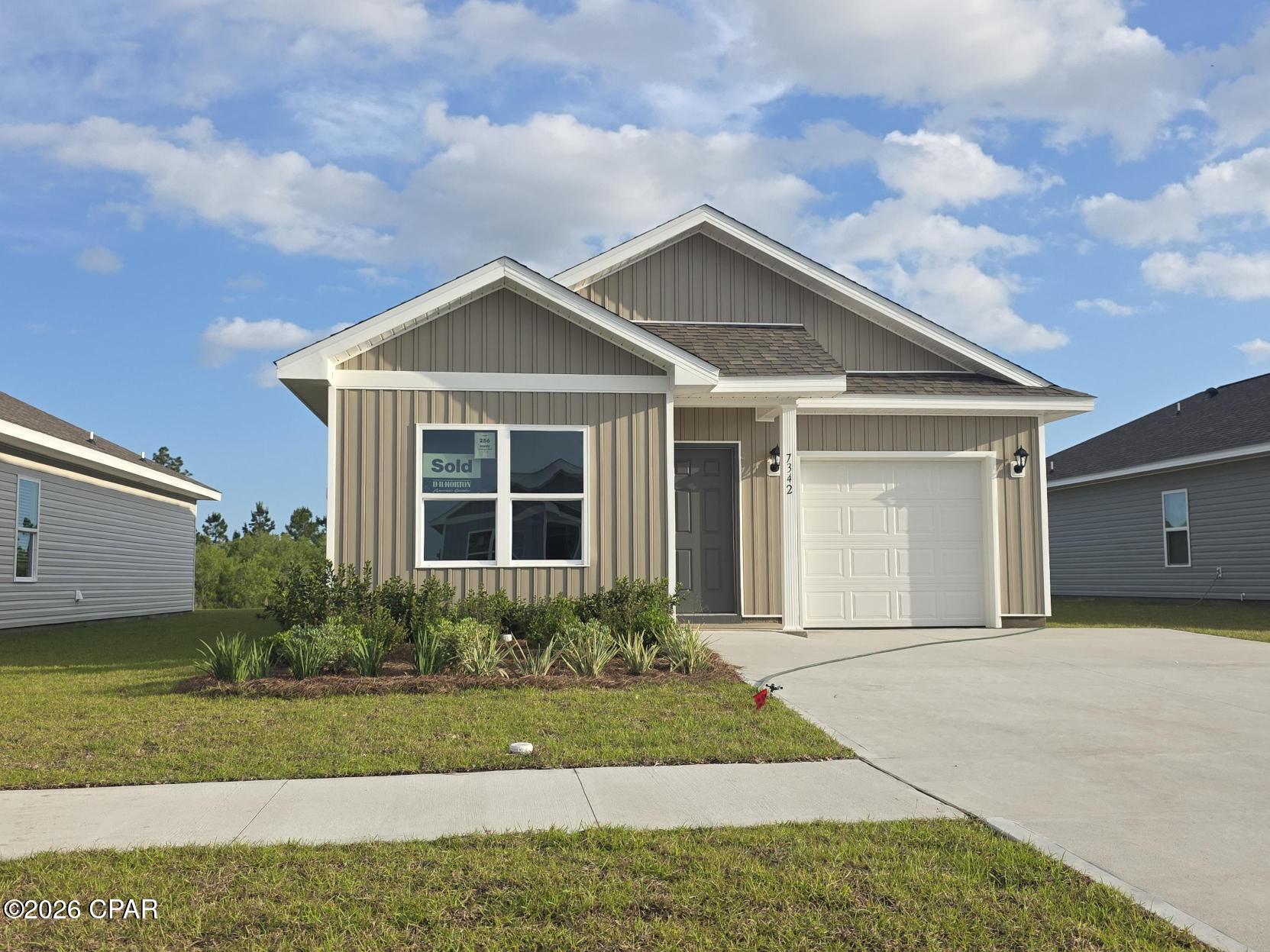 Welcome to the Poppy, a new plan located at Liberty in Panama City, Florida. The Poppy is a spacious 3-bedroom, 2-bathroom home spanning 1,281 square feet and features a single car garage. As you walk inside, you will be welcomed by the Engineered Vinyl Plank flooring which spans the main areas and bathrooms with soft carpet in the bedrooms. Upon entering, the front entrance is met with a long hallway next to the bedrooms and full bathroom next to the garage. Walking down the hallway, you'll find the natural light pouring into the open kitchen and living area, offering ample space for all your needs.

The Primary bedroom is conveniently located off the living area, providing a private retreat at the back of the home, complete with a bathroom and walk-in closet. The kitchen comes with an island for extra counter space, and you'll find stylish granite countertops in the kitchen and bathrooms seated on beautiful white cabinetry. Your new home also comes with our Smart Home Technology package, designed to elevate your living experience with elegance and modernity. This package offers unparalleled convenience, giving you effortless control over key features such as lighting automation, an IQ panel, a video doorbell, keyless front door entry, and temperature control from your smartphone.

On the outside of this popular plan, you will see durable vinyl siding, a rear patio to enjoy the spacious back yard. Sidewalks line the neighborhood streets for you to enjoy the beautiful Florida weather. Our Liberty community features underground utilities making it less susceptible to damage from severe weather leading to fewer outages and more reliable service. Residents of Liberty can enjoy exclusive access to two amenity centers, complete with two pools, a children's splash pad, two playgrounds for endless fun, a well-equipped fitness center, two pickleball courts and a basketball court to name a few things. To learn more about this home for yourself, call us to get connected today!