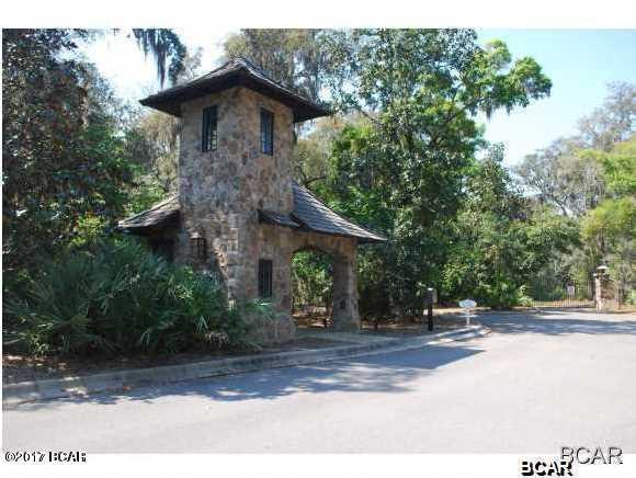 Lowest priced lot in a gated community. Best neighborhood in Bay County, watch deer walking through your back yard. Secluded property, great gated neighborhood, under ground utilities, low association fees.  Close to shopping, marinas, golf courses, bay & Schooners. $125 Capital Contribution Fee $ 50 Transfer Fee per lot The building restrictions have been lowered to make it easier to build. 2 homes currently under construction.