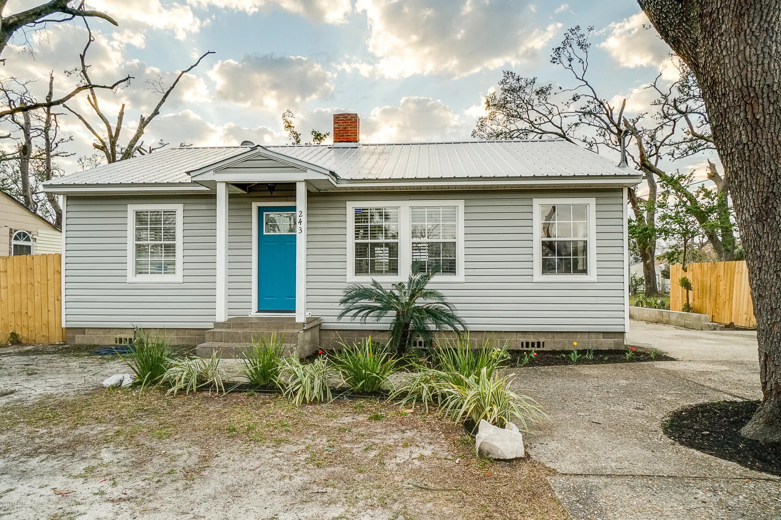 Check out this remarkable craftsman home, totally updated and ready to move in! 2 bedroom, 1 bath featuring the classic cove hardwood floors, concrete counter tops, barn door access to laundry/office space addition. Located in the heart of Panama City's downtown district this home is just a short walk from Massalina bayou or St Andrews bay, as well as plenty of restaurants and shoppes. This home had minimal hurricane damage and all repairs have been completed.