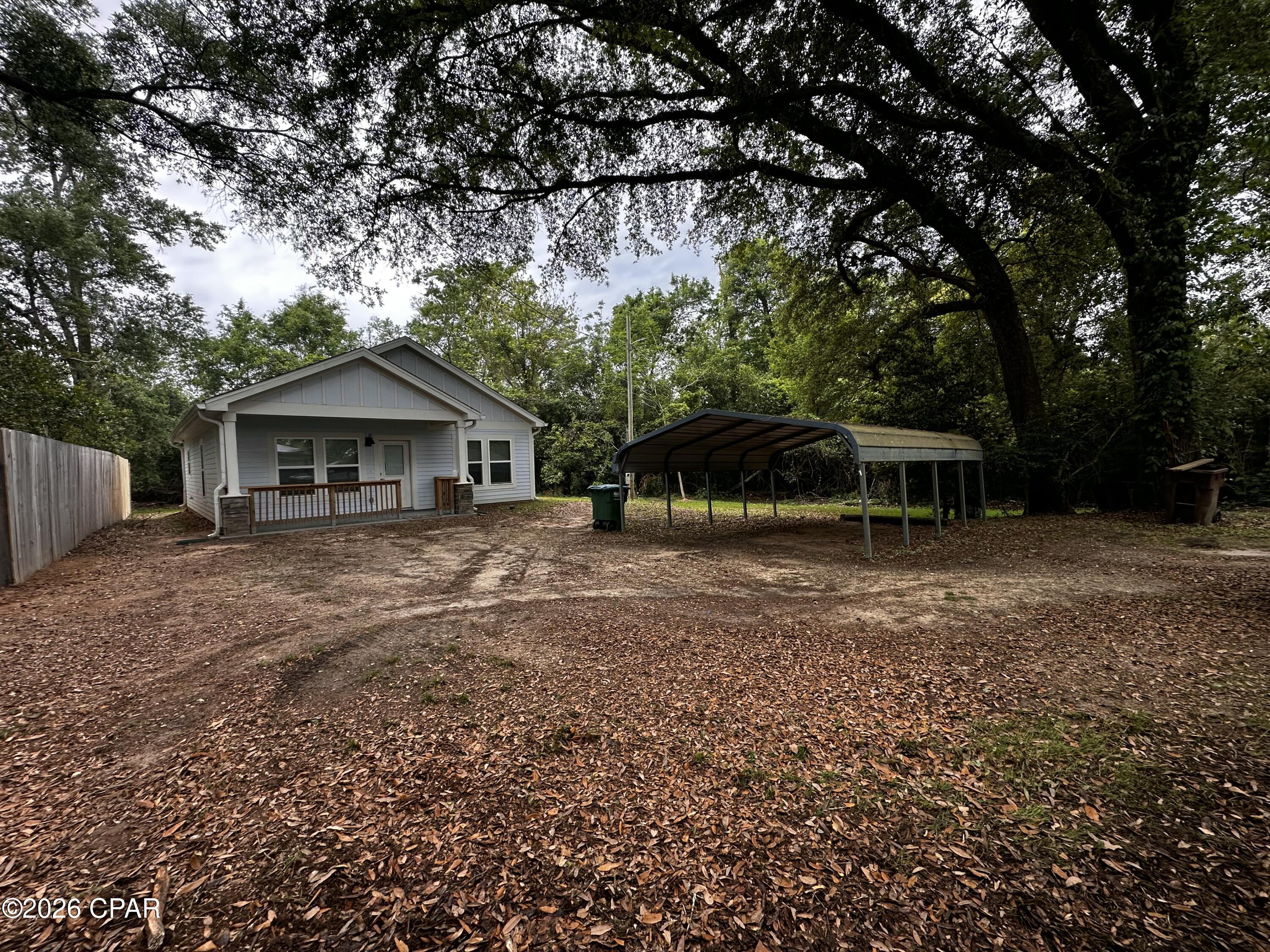 Brand New Feel, Smart Value: Two Bedroom, Two Bath home in Sneads built in 2023 and still feeling brand new! This home offers modern comfort in a secluded setting just off Highway 90 in Sneads. Enjoy a large living area with an open, versatile layout, perfect for daily living or entertaining. 
The property has a mobile home on it that will be removed and cleaned prior to closing.