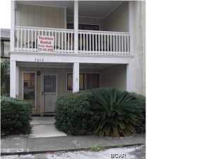 Extremely nice furnished townhome across the street from the beach! Tile and carpet, breakfast bar, fireplace, open floor plan, covered balcony, washer and dryer, and fenced back yard with gazebo.