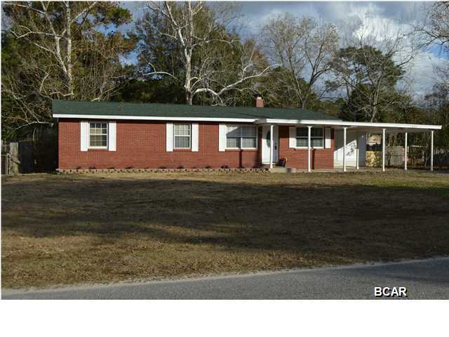 UPDATED AND CHARMING! This home will surely catch your eye! The kitchen has BRAND NEW CABINETS, BACKSPLASH AND HARDWARE. The bathrooms have both been renovated recently. Large, fenced in back yard features TWO yard buildings. The large, open living area has a nice, cozy fireplace. Home is under a termite bond. Easy to show! Call your Realtor today!