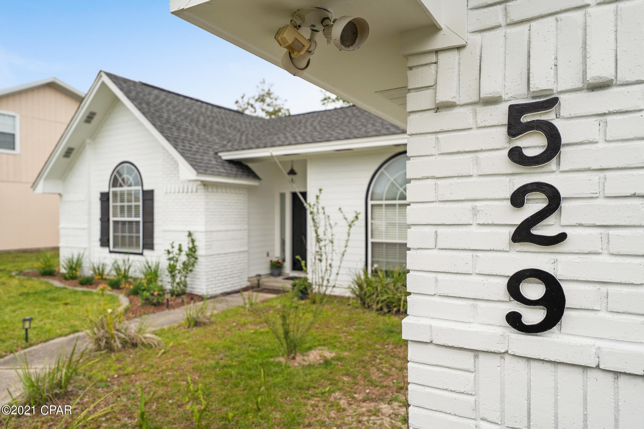 CURRENTLY UNDER CONTRACT, SELLER ACCEPTING BACKUP OFFERS Pool Home! This well build brick home has a very large inground heated pool! Perfect for year-round fun in the back yard. This home is a well laid out split bedroom floor plan that has been updated and renovated, with a large living room with vaulted ceilings, wood burning fire place with lots of oversized windows letting in ample light and abundant views of your back yard oasis. This home also offers a large formal dining room that can accommodate a very large table for all your get togethers. In the kitchen you will find a breakfast nook that overlooks the large back yard and huge pool, Stainless steel appliances, elegant back splash and loads of counter space. In the master bedroom you will find a large room with cathedral ceilin to the back yard and a walk-in closet. In the maser bathroom you will find a double vanity, tile shower with tile inlays and tall shower heads. Throughout this home you will find Luxury vinyl plank flooring making this home easy to clean and maintain. The 2 additional bedrooms are good sized with large closets and lots of natural light. This home is also close to Tyndall AFB and just minutes to parks and boat ramps. Call today for a showing.
