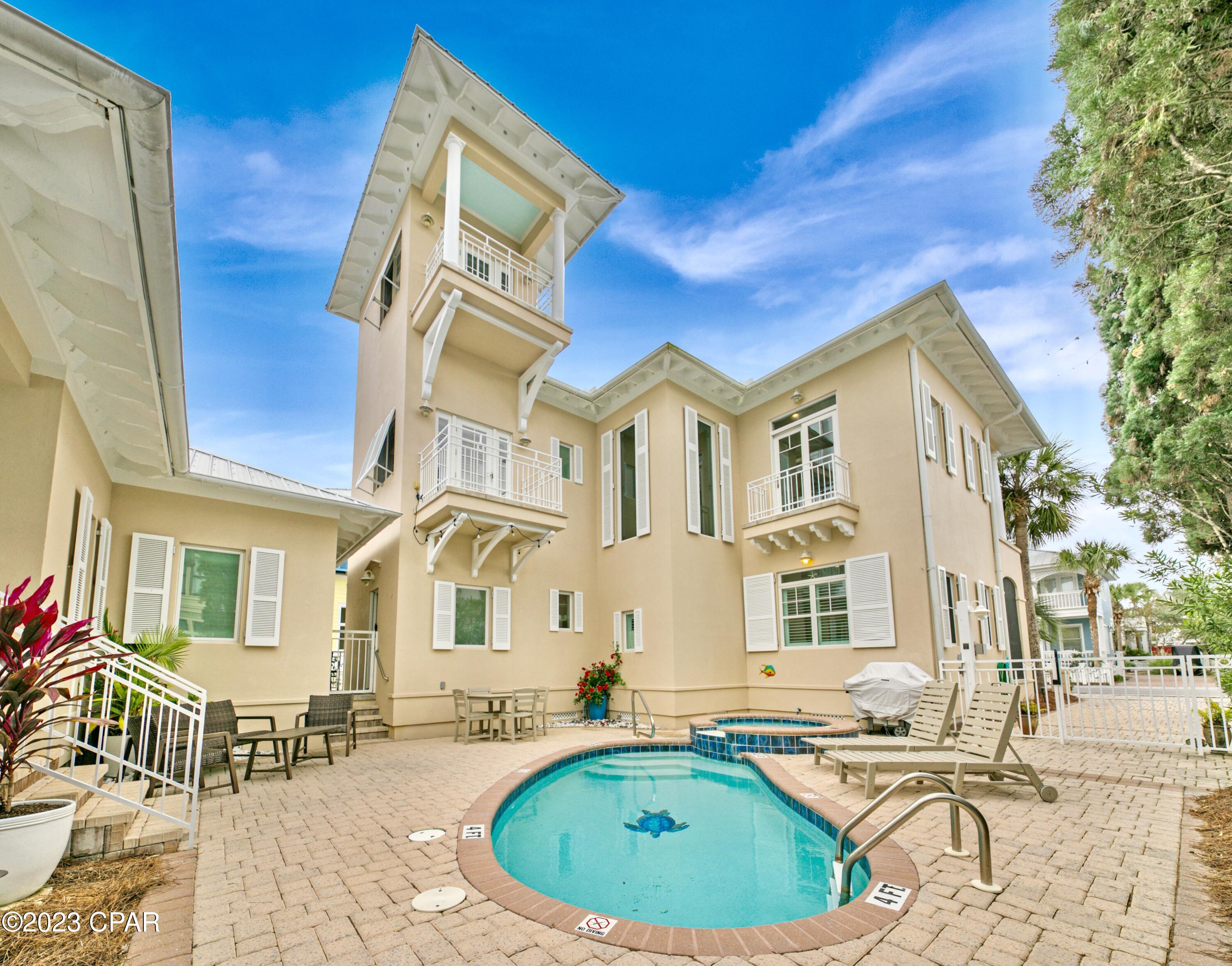 This is IT -- the beach house of your dreams, just STEPS to the sand! One house away and across the street from the direct beach access. A 4/3.5 Carillon Beach beach house with private pool/hot tub and guest house.  If you want Carillon Beach at a reasonable price, this is your chance.  This home is also under management as a vacation rental with 2022 gross nightly revenue of $134,980 and booking revenue for 2023 thus far of $127,120.  This gem has been lovingly cared for and recently painted/upgraded.  The home is being sold as-is, fully furnished.  Carillon boasts 3900 linear ft. of pristine, just re-nourished, never-crowded sugary sand beach.  
Carillon Beach is a private, exclusive, gated community offering 3 community pools (two heated year-round, tennis court, pickle ball courts, children's play area, full court basketball area, meeting house and select shops and dining opportunities.