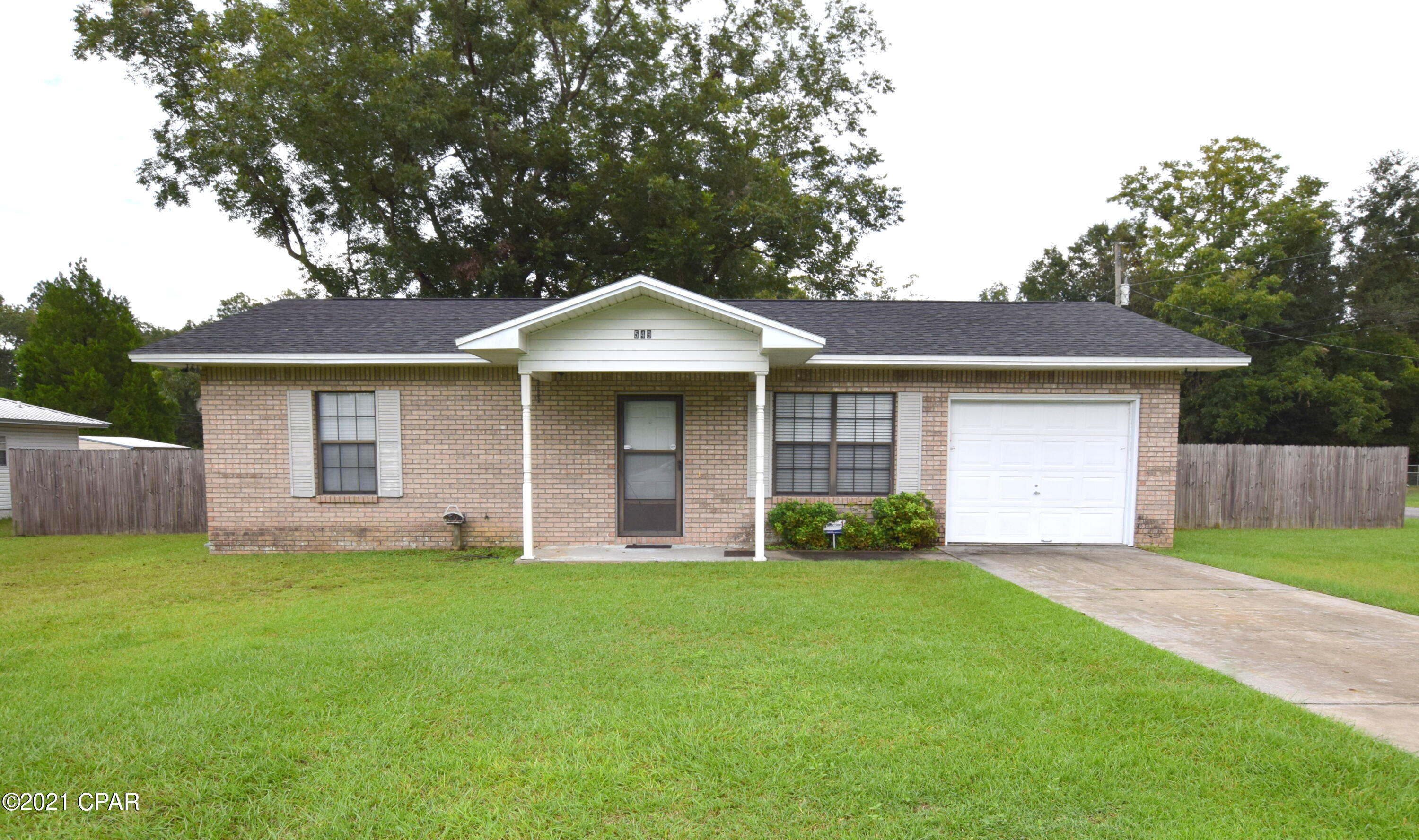 Nestled in the heart of Chipley on a corner lot sits this well-maintained brick beauty! Inside features include a spacious living room, eat-in kitchen, 2 bedrooms, full bath and home surveillance system. Outside you will find an attached garage, front/back porches and privacy fenced backyard. Property is located in a quiet neighborhood close to restaurants, shopping and schools!
