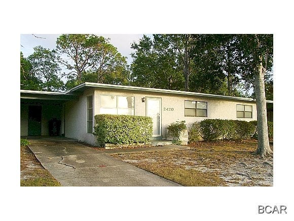 Great home with ceramic tile and carpet, family room with fireplace, separate laundry room, office, breakfast bar, carport, privacy fenced back yard, and centrally located.