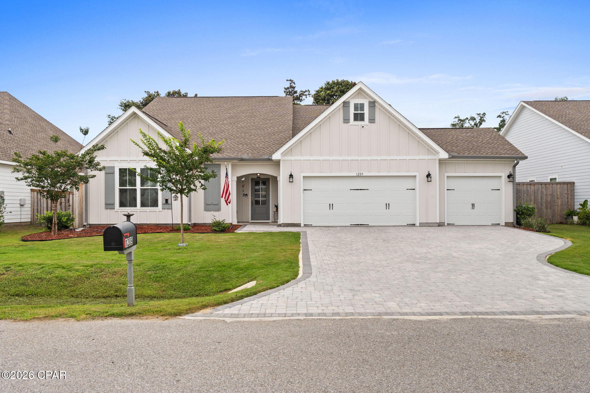 CURRENTLY UNDER CONTRACT, SELLER WILL CONSIDER BACKUP OFFERS.  Welcome to 1209 New Hampshire Avenue! Stunning, spacious, and move-in ready. Why wait for new construction when this gorgeous 2023 home in the heart of Lynn Haven is ready for you today. With 4 bedrooms, 3 full baths, and a 3-car garage, there is room for everyone and everything. Loaded with upgrades, professionally painted, and professionally deep cleaned to perfection -- all you have to do is unpack and start living!
Step inside and you are immediately welcomed by an impressive 8-foot wide hallway with soaring 9-foot ceilings that create an open, airy feel with effortless flow throughout every inch of the home. The thoughtfully designed split floor plan ensures everyone has their own space and privacy.
To the left, two bedrooms share a beautifully appointed guest bathroom -- ideal for kids or guests. Continue down the hall and you will find a third bedroom with its own private bathroom featuring a shower and tub combo, making it a perfect setup for multi-generational living or hosting weekend guests.
The massive 3-car garage is a true bonus space -- featuring pull-down attic stairs for holiday storage, a conveniently located water heater, and plenty of extra room for your golf cart. A huge laundry room with shelving, an oversized coat closet, and direct garage access make everyday living effortless.
The heart of the home is a stunning open-concept living area flooded with natural light. The kitchen is an absolute chef's dream -- stainless steel appliances, quartz countertops, a gray ash island, tile backsplash, soft-close drawers, an abundance of cabinet space, and a large walk-in pantry. A formal dining area makes hosting holidays and gatherings with family and friends a breeze.
Whether you love to grill out or enjoy a quiet cup of coffee in the morning, the covered back porch is your perfect retreat. The completely fenced backyard features a custom board-on-board 8-foot privacy fence -- a safe haven for kids and pets alike.
After a long day, retreat to your primary suite tucked away from the other bedrooms for maximum privacy. The spa-like primary bathroom features his and her sinks, a separate soaking tub, and a walk-in shower. The primary closet offers ample room for all your clothes and storage needs.
Seller upgrades set this home apart -- a beautiful stone paver driveway adds incredible curb appeal, gutters provide long-term protection, a backflow is already in place, and the home is protected by a professional ADT security system. There is an active termite bond on the property. Every major system is covered with a 3-year-old roof, HVAC, and water heater -- plus public water and sewer. Best of all -- NO HOA fees.
Location is everything! Lynn Haven Elementary, Mowat Middle, and Mosley High School are all just minutes away. Sharon J. Sheffield Park and A.L. Kinsaul Park -- with waterfront views, a dog park, and kayak launch onto North Bay -- are right down the road. Boaters will love the easy access to multiple bay launches. Publix, Winn-Dixie, and everyday shopping are all within 2 miles. And when the beach calls, the sugar-white sands of Panama City Beach are just 20 minutes away!
This home truly has it all -- space, style, upgrades, and an unbeatable location. Don't miss your chance to own this gem in Lynn Haven!