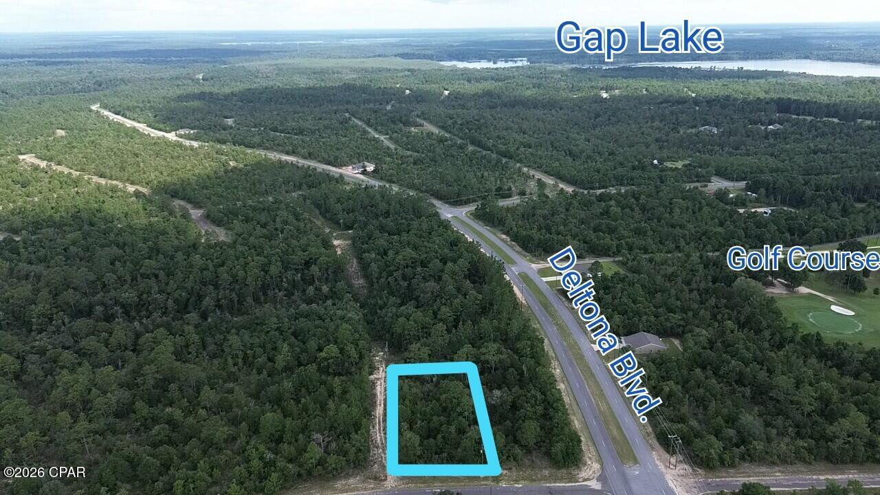 Discover the perfect canvas for your Florida lifestyle on this spacious 0.46-acre parcel in the desirable Sunny Hills community in Chipley, FL. Nestled in a peaceful, growing subdivision, this level lot offers ample space to design and construct your ideal single-family home, with room for outdoor living, gardening, or future expansions. Sunny Hills is a golfer's and nature lover's paradise, featuring an acclaimed 18-hole golf course at Sunny Hills Golf Club with wide fairways and large greens that provide enjoyable play for all skill levels. Residents enjoy access to a scenic boat lake, a swim park, multiple additional lakes ideal for fishing or swimming, and community parks for relaxation and recreation. The community is experiencing exciting growth, with multiple reputable builders actively constructing new homes, bringing fresh energy and modern residences to the area. Convenience is at your doorstep with a Dollar General market right at the entrance of one of the main boulevards, making everyday errands effortless. Location is unbeatable: Just 30 minutes from the charming city of Chipley for shopping, dining, and services, and under an hour's drive to the stunning white sands and emerald waters of Panama City Beach perfect for weekend getaways or day trips to the Gulf Coast. Whether you're seeking a peaceful retreat surrounded by natural beauty or a vibrant community with endless outdoor amenities, this lot in Sunny Hills offers the ideal blend of tranquility, recreation, and convenience. Don't miss your opportunity to secure a piece of Florida Panhandle paradise.