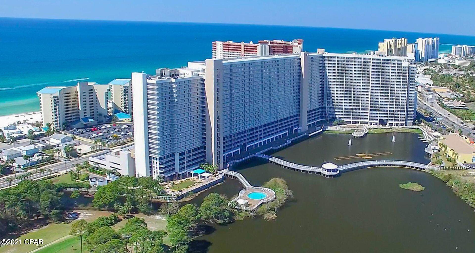 CURRENTLY UNDER CONTRACT SELLER ACCEPTING BACK UP OFFERS!  - One of the nicest and best priced units in Laketown Wharf. for Cash Buyer The huge balcony Faces the Gulf of Mexico. Unit was a full-time residence but has all new

HVAC , Stainless Appliances and furnishings. Pictures coming soon of Interior. You can make this your 2nd home or Income Producing Vacation Rental or both. This unit will not last long. Laketown Wharf boasts many amenities from mini golf to several Pools and a Boardwalk on the backside facing the lake, with restaurants and shops right there. There is a covered Parking garage on each side  Condo is located directly across the road from the Beach so if

the extra 100 yards is worth the huge savings in the difference in price, then this is your best bet.