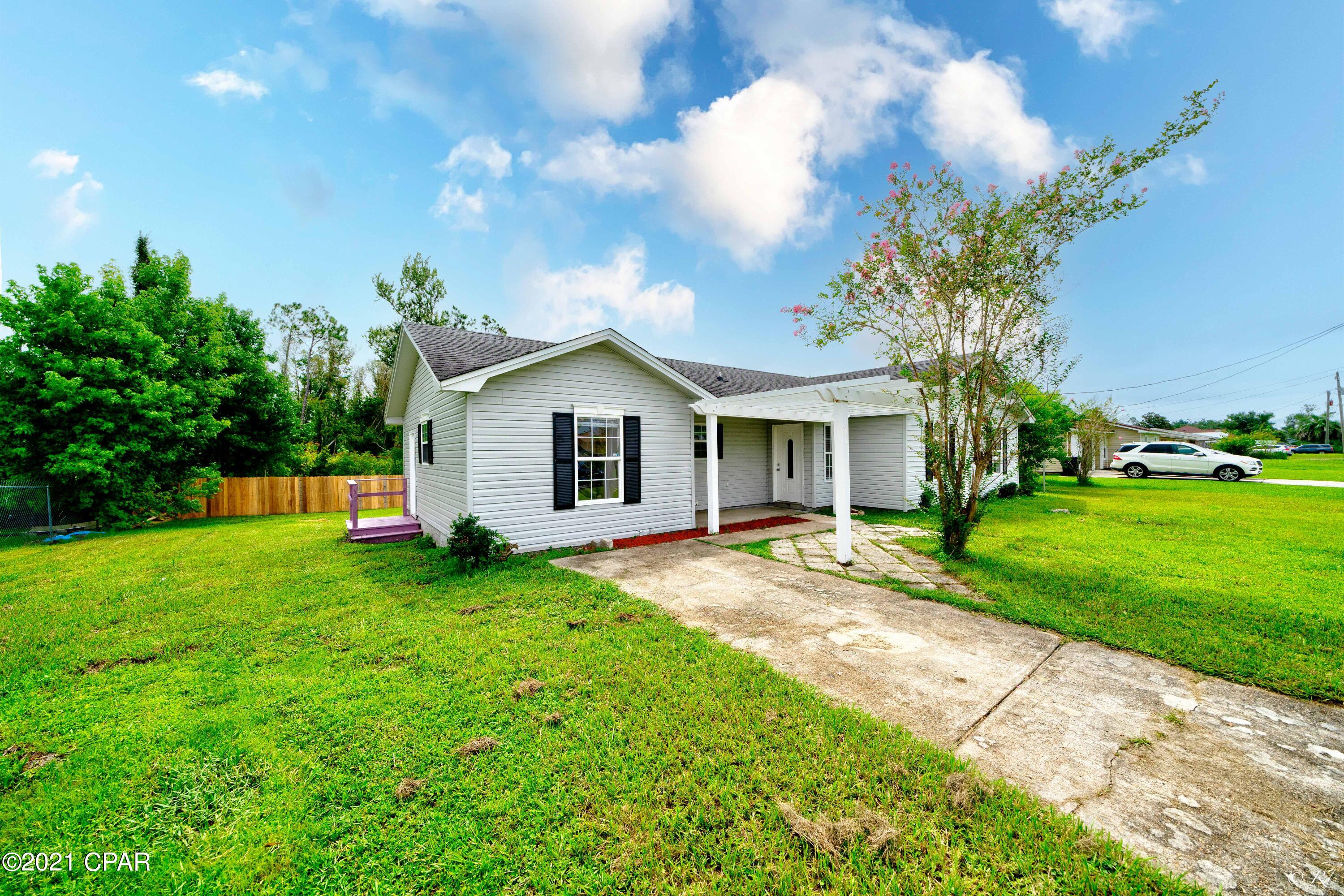 4 bed, 2 bath home located in the peaceful and established Morris Manor Estates community. The large living area boasts vaulted ceilings and French doors leading to an open sunroom bringing in plenty of natural light to enjoy the Florida sunshine. The eat-in kitchen features stainless steel appliances, a Bay window and a large pantry. The master bedroom boasts its own private ensuite and French doors leading to a second sunroom for plenty of peace and privacy. The master bathroom is equipped with a shower/tub combo, tile flooring and new light fixtures/fresh paint. The three guest bedrooms share a bathroom which features surround tile, shower/tub combo and an updated vanity. The third guest bedroom could also be used as an office space or a playroom. This home boasts a large backyard area with a deck to enjoy time with family and friends. This home is located near grocery stores, schools, and restaurants for your convenience. Check out this beautiful home!